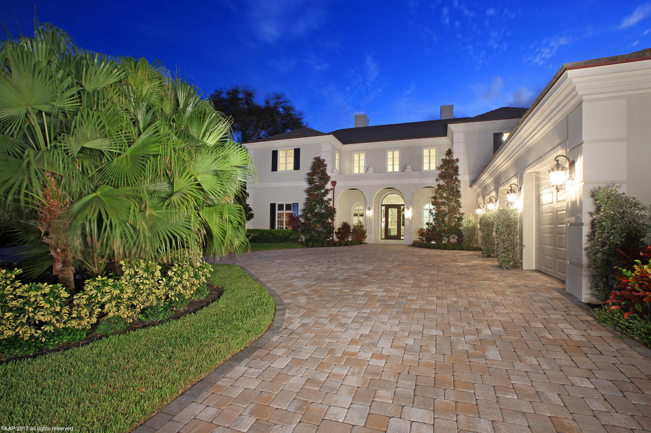 NEW CONSTRUCTION ESTATE ON 125' DEEP WATER CANAL WITH OCEAN ACCESS AVAILABLE FOR IMMEDIATE OCCUPANCY. Exquisitely designed custom home located in exclusive Frenchman’s Creek Beach & Country Club offers the utmost standards in structural integrity and design. This 7 Bedroom, 9.1 bath Estate home embraces both grand and casual life styles. All baths have upgraded custom cabinets, stone tops, frameless glass enclosures. Designed in a French Chateau style this estate home has timeless appointments and materials, impact windows, marble flooring, designer kitchen with custom wood cabinetry, two Sub Zero refrigerators, two Bosch dishwashers and a Wolf cooking center. Other features include a spacious open family room, formal dining, French doors leading to (See Supplement)... private covered loggia with magnificent views of pool, spa and private dock that can take up to a 52 ft. boat, with lift. Boat lift is sold as-is.

This custom home features the latest in home technology.  This solid construction can withstand 200 mile winds. It's insulated with E-15 in the walls for sound proofing and energy efficiency. Home automation system with camera security, programmable LED lighting and audio/video distribution you can control from anywhere in the world. Custom ceiling treatments, fireplace, custom moldings and too many appointments to mention them all. Downstairs master suite has spacious closet space, ready for your design,  with his and her bathrooms, spa tub and custom showers. Flexible upstairs has its own living area with breakfast bar, six bedrooms and six bathrooms, an extra large room can be used at a playroom/media room/storage area and has additional washer and dryer closet. 4 top of the line AC units all housed in a large AC closet  Three car garage plus double golf cart garage.
