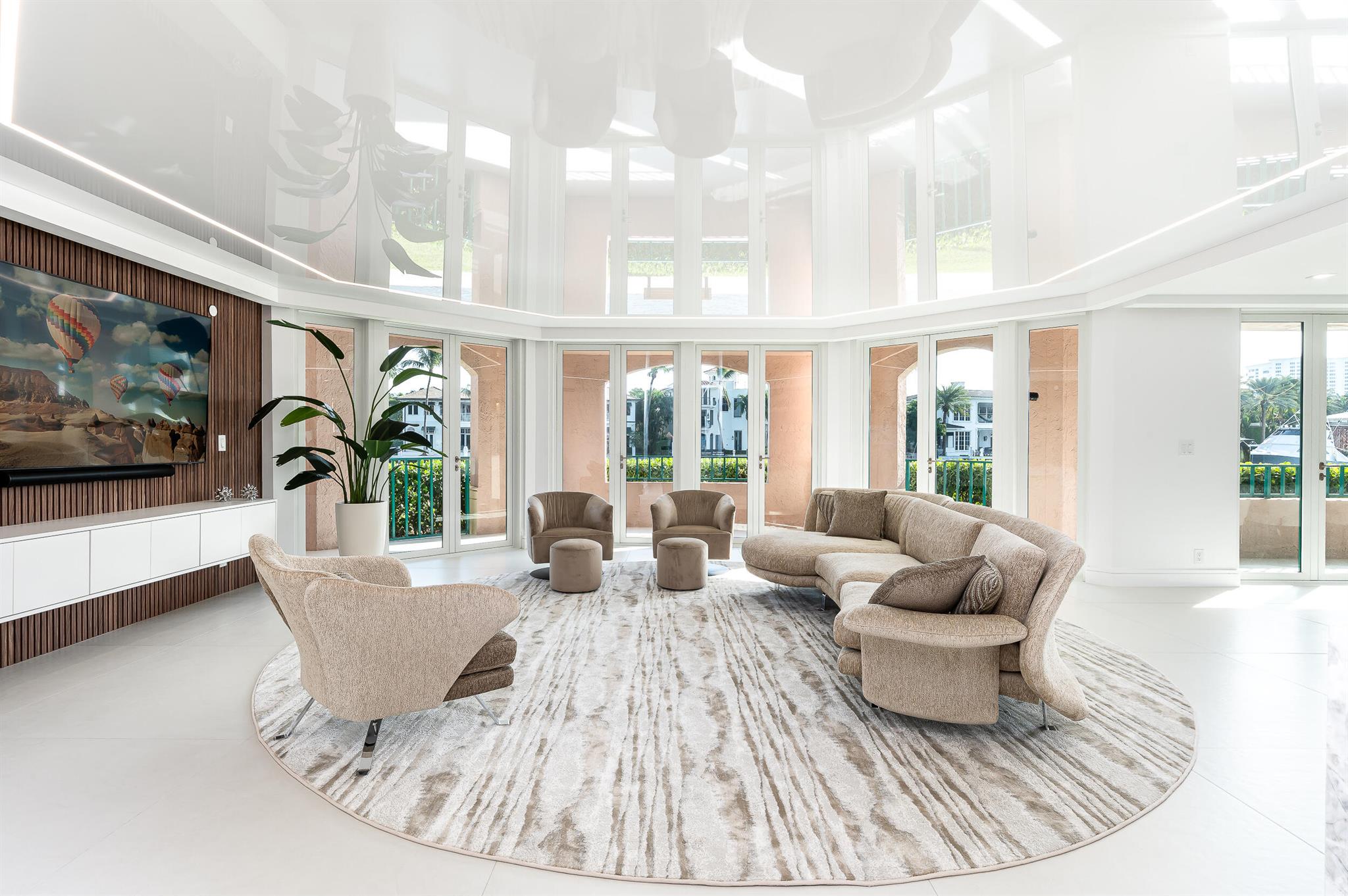 Water - Water - Water from every room!  Rare, Renovated Condo that feels like a private home.

Prepare to be captivated by this truly stunning, Newly Re-imagined,Newly Renovated for the 2024/25 Season), Pet Friendly, East-facing 3 Bedroom + Media Room Condo boasting 2,772 sf of living space and wraparound 962 sf patio. 

(PRIVATE 50' BOAT SLIP, available but not included, 40 feet from your patio door).

Located in Mizner Court, within the prestigious gated enclave of Mizner Village on the grounds of  The Boca Raton Resort & Club, this RARE (only 15 3BR's exist of 200 Total units), reconfigured three-bedroom (plus Media Room) residence features New Full Impact Hurricane Windows & Doors. Tastefully decorated (furniture / accessories NOT included) from renowned brands like Sklar, Arhaus, Bernhardt, Clive Daniels, etc., with Sleeper Sofa in media room and motorized blinds in the living areas, sheer curtains / blackout in bedrooms. 

Enjoy breathtaking direct Intracoastal views from its expansive 962-square-foot Private balcony (30' from the water) with the possibility of multiple seating areas to soak in the scenery of passing boats and glittering water. (PRIVATE 50' BOAT SLIP, available but not included, 40 feet from your patio door). 

Indulge in Mizner Court's resort-style amenities including 2 Olympic-sized pools, 4 outdoor whirlpools, 2 tennis courts, 2 gyms (strength & cardio), party/card room, billiard/library room all set within this lush 13-acre gated property with 800' of water-frontage on the Intracoastal, 24-boat slip marina, secure garage parking, abundant guest parking, 24-hour security, package delivery and beautiful atrium lobbies.

Pet-friendly and ideally located near dining, shopping, and pristine beaches, Mizner Court offers a lifestyle of unparalleled beauty & convenience.

Stroll along the private Mizner Village Intracoastal promenade to discover the serenity of Lake Boca and the vibrant energy of The Boca Raton Harborside Resort & Club (resort guests, club members ONLY).

Please note that Mini-Bus service is available directly across from Mizner Court at The Boca Raton Bungalows with stops at The Boca Raton Harborside Resort, Harborside Pools, and The Boca Raton Beach Club. (Club Membership is NOT included).

Embrace this Rare Opportunity to own an East-facing top quality renovated waterview condo within the esteemed Boca Raton Harborside Resort & Club grounds.  Only 15 three bedroom units exit out of 200 condo units in Mizner Court. Quarterly maintenance has reduced to $1.18/sf.  Disproportionately low for a unit of this size.

Mizner Court is undergoing property enhancements to include the upper deck garden areas (North garage roof- approximate completion 1st qtr 2025 - South garage roof - scheduled start 2nd qtr 2025) courtyard, front façade, building roof, approved change of building paint color to "white", etc.  See docs for more details. 

This property's location within club grounds, with no fixed bridges, walkability to Palmetto restaurants, the beach, and the option of a 50' boat slip, makes it an exceptionally rare opportunity. 

Now's the time!  This Condo has it all and shows even better in-person.  The future is bright at Mizner Court!