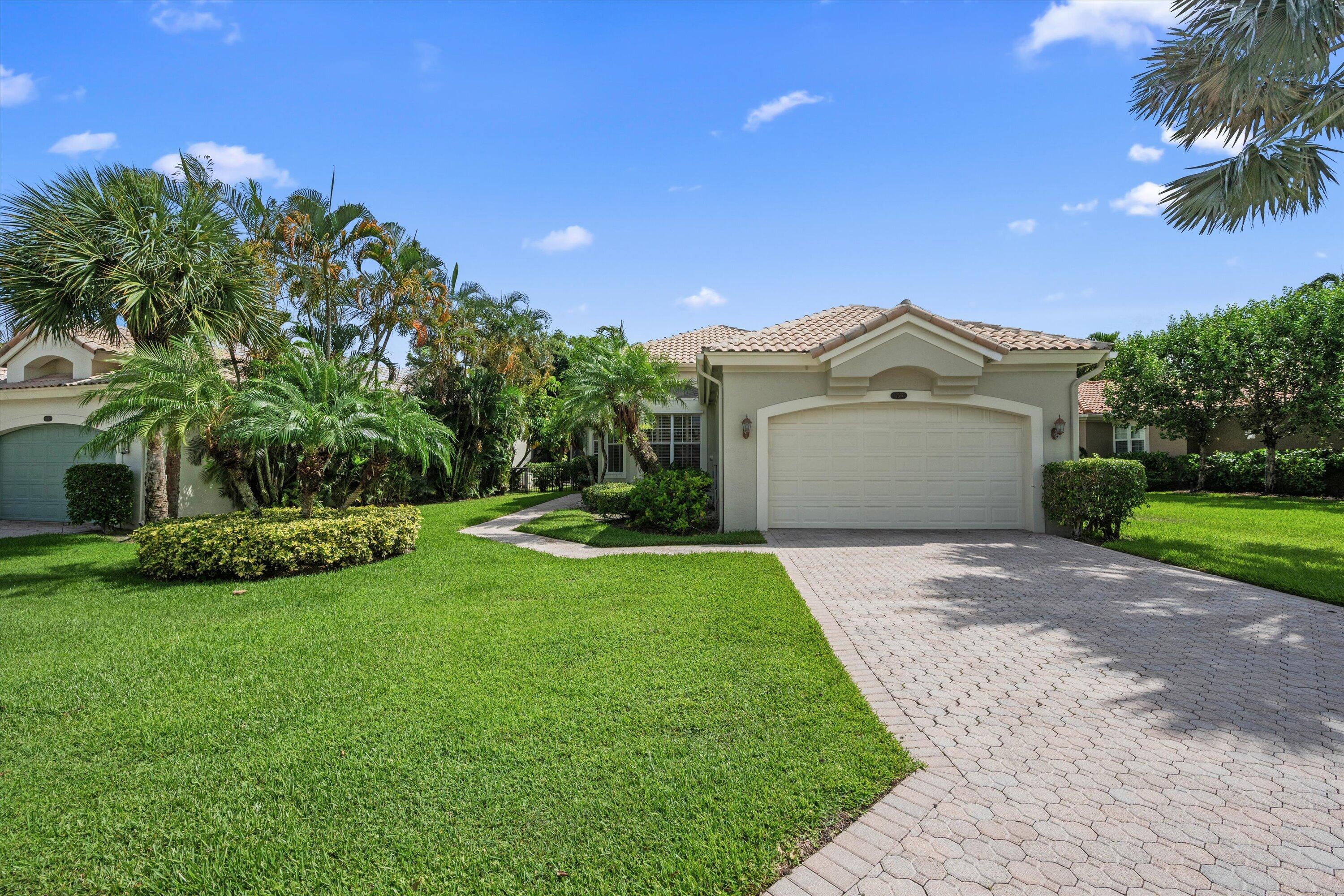 Positioned within the exclusive gates of Palm Beach Polo Club, this inviting single-story residence offers a rare combination of privacy, comfort, and resort-style living in the heart of Wellington. Bright and welcoming, the home embraces the South Florida lifestyle with soaring ceilings, abundant natural light, plantation shutters, and seamless indoor-outdoor living. The thoughtfully designed floor plan features a spacious gathering area ideal for entertaining and everyday living. An updated kitchen with stainless steel appliances serves as the heart of the home, where mornings begin with coffee and natural light, and evenings wind down with family and friends. The living and dining areas flow effortlessly toward the private backyard retreat, creating a seamless connection between indoor  comfort and outdoor relaxation. Recently painted throughout the interior, the home offers a fresh, inviting feel while reflecting pride of ownership at every turn.. The screened and covered patio opens to a wonderful pool surrounded by private landscaping, creating the perfect setting for morning coffee, afternoon relaxation, or evening gatherings with your loved ones. The fenced yard provides additional privacy, and a tranquil backdrop rarely found in such a coveted location. The primary suite offers a peaceful escape, complete with generous closet space and an upgraded bathroom featuring dual vanities, a soaking tub, and a separate shower. Thoughtfully upgraded guest bathroom adds to the home's appeal, while two additional bedrooms provide flexibility for guests, family members, or a home office. A two-car garage, mature landscaping, enhance the property's appeal. Located just minutes from Wellington's internationally recognized equestrian venues, dining, shopping, and recreation, this exceptional Palm Beach Polo Club residence presents an outstanding opportunity to enjoy one of South Florida's most desirable gated communities.