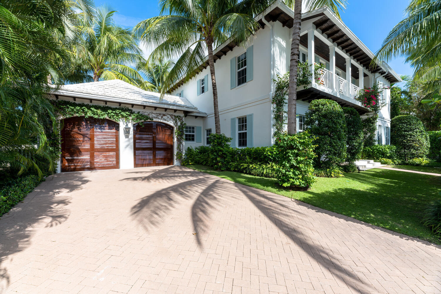 Beautiful British West Indies 4 Bedroom 5.2 bath home by renowned architect Patrick Segraves. This newer built 2016 residence features 11 ft ceilings upstairs and down.   An elegant double height central entrance hall leads to the spacious living room, where a wall of French doors let in maximum sunlight and open to the outdoors. There is a magnificent top of the line luxury eat-in kitchen.  Covered loggias on the first and second floor overlook the lushly landscaped gardens and extended lap pool.  A built-in grill, outdoor half bath and shower provide for relaxed indoor and outdoor living.  The upstairs primary bedroom has his and hers marble baths and two enormous walk-in closets.  Three guest bedrooms have luxury en-suite white marble baths including one on the ground floor.  The home has all impact glass windows and doors, large elevator, and generator.  The house is meticulously maintained to the last detail. Central in-town location, with easy access to beach, lake trail, shops and restaurants.