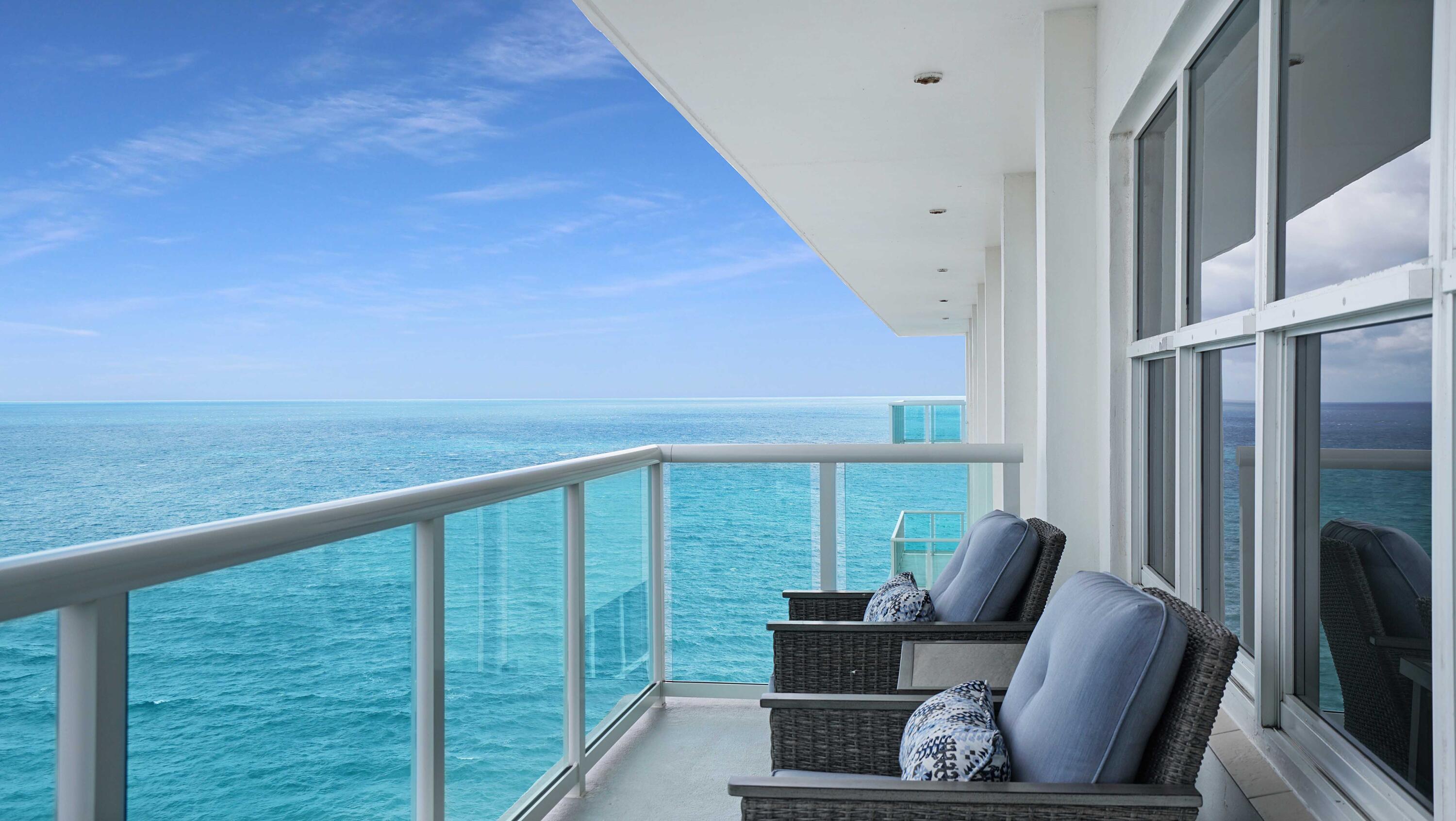 Rare 20th-Floor Direct Oceanfront PENTHOUSE ANNUAL UNFURNISHED RENT ! Experience the pinnacle of coastal luxury at the prestigious Ocean Riviera. Perched high above the sand, this residence offers breathtaking 180-degree unobstructed ocean and city views.  Custom Design: Open-concept layout with a gourmet kitchen, massive chef's island. Spa-inspired bath with premium finishes and large walk-in closet. Luxury Features: Impact glass throughout, in-unit washer/dryer, and dual exposure for sunrises and city lights. Amenities: Private beach access, heated oceanfront pool, gym, and 24/7 lobby attendant. Steps from world-class dining.