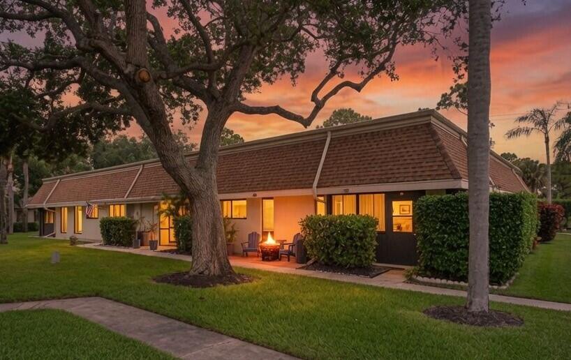 You must see this well maintained Villa in the desirable Indian Creek Community. Nestled on a quiet cul-de-sac, mature palms and majestic live oaks provide beautiful shade and a peaceful setting. Both bathrooms have been tastefully updated, including custom cabinetry in the guest bath. Additional highlights include granite kitchen counter tops, abundant closet space, new luxury vinyl flooring, a new hurricane impact kitchen window, new windows in the family room with accordion shutters, custom laundry room cabinetry, exterior storage and so much more!  Ideally located in the heart of Jupiter, this gorgeous and unique villa is just minutes from pristine beaches, world class golf, shopping, dining and entertainment.  Don't miss the opportunity to make this exceptional property your new home.