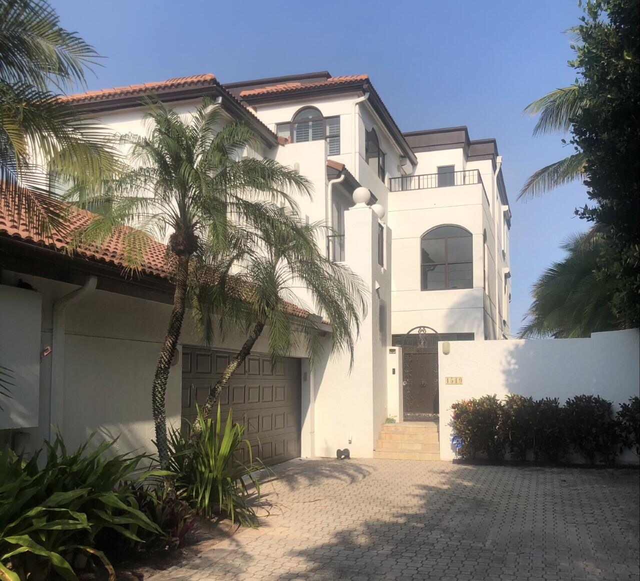 End unit under construction and renovation with private pool and side yard.