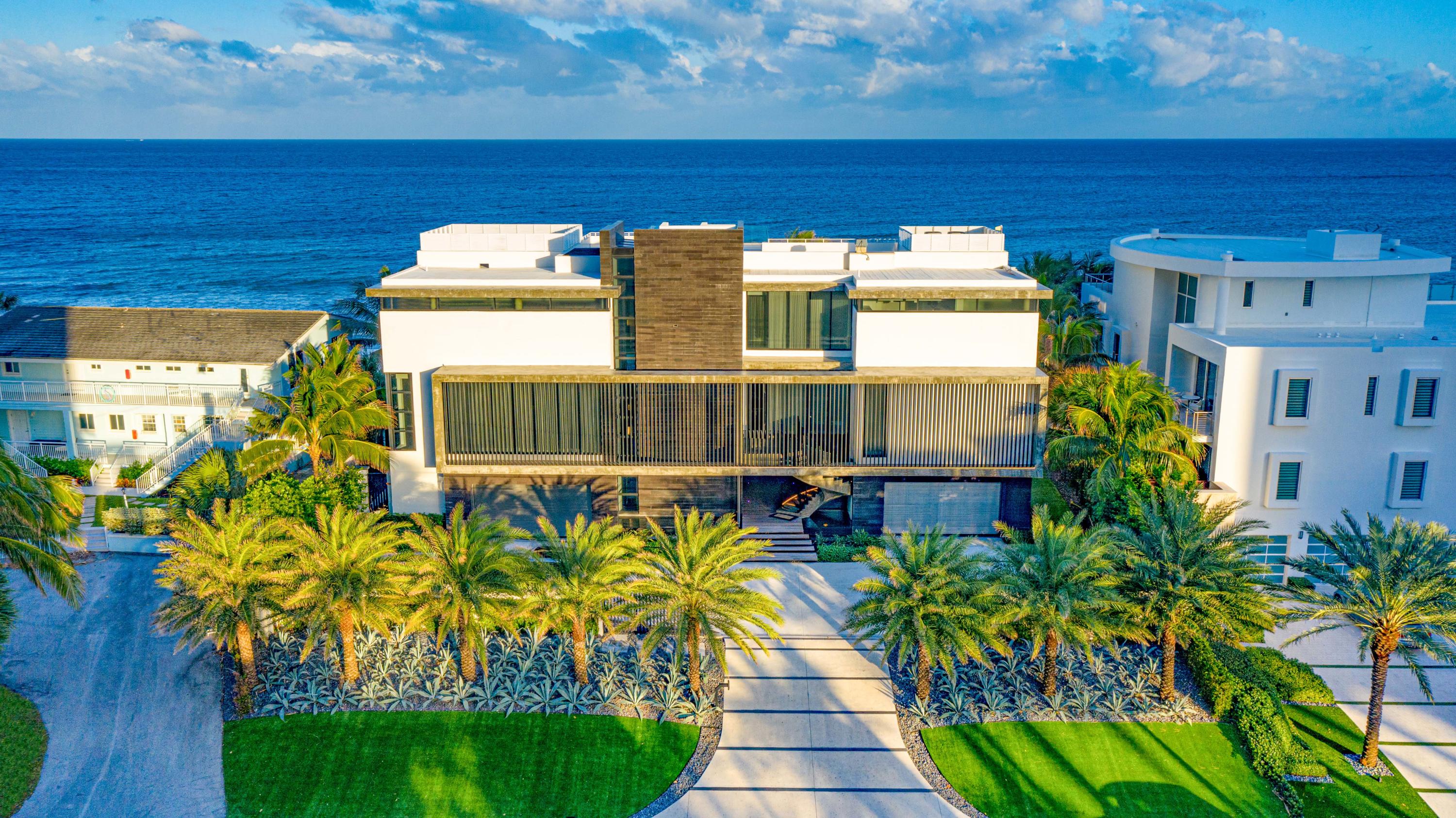 Monumental Modern Oceanfront Estate located on prized South Ocean Blvd on the Northern shores of Boca Raton in Highland Beach. A gated motor court ushers guests to this Tour de Force concrete and stone clad 4-level Oceanfront Estate sited on 120 +/- ft of beachfrontage with striking brise soleil architectural detailing. The main living level (2nd level) encompasses a living room, dining room, club room, theater/screening room, Designer floating kitchen and separate butlers/catering kitchen for entertaining. 3rd level Luxe master wing features a sitting room, Spa-like bath with atrium wellness oasis, Poliform boutique closet, exercise room and oceanfront office/study. Two guest bedrooms suites are also featured on this level. A Roof top (4th level) includes an outdoor sky deck for relaxing or large gatherings with panoramic views of the azure coastline. Lower level (1st Level) boasts 4 bedroom suites, a game room and 2 custom garages that hold up to 8 vehicles. A Resort-like zero edge infinity pool with spa and summer kitchen complete this estate. Additional living amenities include a glass wine display vault, commercial elevator, organic living wall and 2 utility rooms. Shown by appt to pre-qualified buyers with a Letter of Capability from a US Bank with 48 hour notice for weekdays and 72 hour notice for weekends.

Additional Features: Full house automation by Control 4, Surge Suppression and Leak Detection Systems. 


Information published or otherwise provided by the listing company and its representatives including but not limited to prices, measurements, square footages, lot sizes, calculations and statistics are deemed reliable but are not guaranteed and are subject to errors, omissions or changes without notice. All such information should be independently verified by any prospective purchaser or seller. Parties should perform their own due diligence to verify such information prior to a sale or listing. Listing company expressly disclaims any warranty or representation regarding such information. Prices published are either list price, sold price, and/or last asking price. The listing company participates in the Multiple Listing Service and IDX. The properties published as listed and sold are not necessarily exclusive to listing company and may be listed or have sold with other members of the Multiple Listing Service. Transactions where listing company represented both buyers and sellers are calculated as two sales. The listing company's marketplace is all of the following: Vero Beach, Town of Orchid, Indian River Shores, Town of Palm Beach, West Palm Beach, Manalapan Beach, Point Manalapan, Hypoluxo Island, Ocean Ridge, Gulf Stream, Delray Beach, Highland Beach, Boca Raton, East Deerfield Beach, Hillsboro Beach, Hillsboro Shores, East Pompano Beach, Lighthouse Point, Sea Ranch Lakes and Fort Lauderdale. Cooperating brokers are advised that in the event of a Buyer default, no commission will be paid to a cooperating Broker on the Deposits retained by the Seller. No commissions are paid to any cooperating broker until title passes or upon actual commencement of a lease. Some affiliations may not be applicable to certain geographic areas. If your property is currently listed with another broker, please disregard any solicitation for services. Copyright 2021 listing company All Rights Reserved.