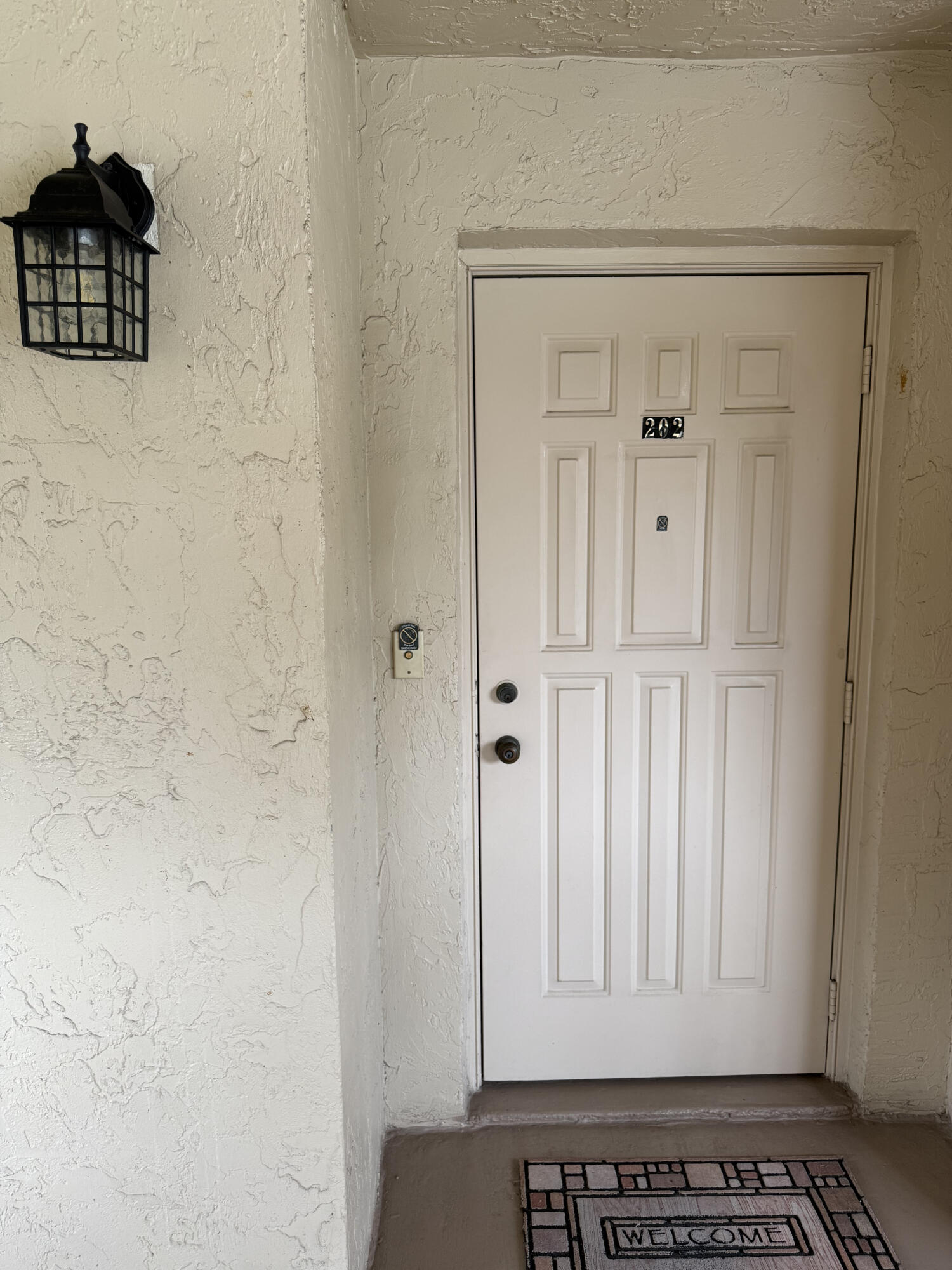 Well Maintained 2 bedroom, 2 bath home on top floor of two-story building. New Washer & Dryer inside. Enclosed patio area with large storage closet. Assigned parking space right in front, and plenty of guest parking too. Gated Community, Clubhouse features Cafe Restaurant, Fitness Center, 2 Resort style pools by Clubhouse, A Smaller Satellite pool is walking distance from condo, tennis, pickle ball, Beauty Salon, Arts & Crafts, card rooms & much more to mention.  This is a 55 community with a nice clubhouse and cafe. Plenty of activities and close to everything. Close proximity to restaurants, shopping, beaches & major airports. Pet ok 25 lbs. and under
