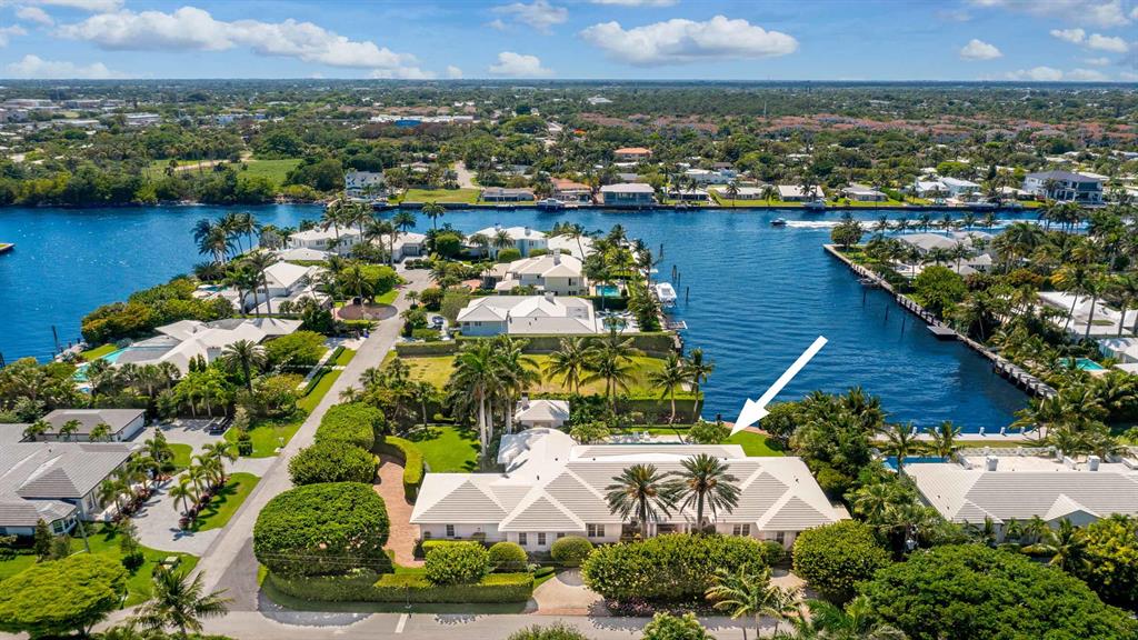The waterfront estate at 525 Middle Rd, Gulf Stream offers the perfect setting for festive entertaining and private retreats alike with lovely grounds and water views. The residence is situated on over two-thirds of an acre with frontage on Polo Dr and Middle Rd. Designed by William Wietsma, the custom-built home features a great floor plan for privacy with formal living and dining room, spacious kitchen and family room, den, master wing plus three en suite guest rooms, exercise room, three car plus golf cart bay garage, and incredible loggia, pool and cabana with summer kitchen and bath. Boaters will appreciate the waterfrontage with dock and easy access to the ocean via nearby inlet. Close to Delray Beach and Palm Beach, this luxurious home is offered furnished and sure to please. FEATURES:
" Custom built waterfront home designed by William Wietsma
" 43 feet of waterfrontage with 28-foot dock and nearby ocean access
" 4 bedrooms / 4.3 baths
" 5,811 square feet under air / 7,971 total square feet
" Offered fully furnished
" Situated on over two-thirds of an acre with expansive grounds
" Circular drive on Polo Dr and private drive and garage on Middle Rd
" Foyer entry with views of impressive interior, pool and water
" Formal living room with fireplace and French door access to covered loggia
" Formal dining room with French doors, easy access to kitchen and nearby wet bar and wine cooler
" Spacious kitchen with two islands, snack-bar seating and pantry
" Family room off kitchen with bay window breakfast area and French doors to covered loggia and pool
" Cypress paneled den with built-ins and French doors to grounds
" Private master wing with beautiful water views and French door access to grounds; two walk-in closets; master bath with dual vanities, jetted tub and walk-in shower
" Three en suite guest rooms
" Laundry room with sink and ample cabinets for storage
" Exercise room with large closet could be a game room or smaller office
" Powder room off foyer and powder room across from laundry room
" Covered loggia with outdoor living and dining areas; inviting pool with patio for lounging; cabana with summer kitchen, grill, outdoor shower, bath and pool storage
" Professionally landscaped grounds with private backyard
" Private 28-foot dock with electric and water available
" Three car garage plus golf cart bay
" Impact windows and doors; whole-house generator
" Fabulous location near Gulf Stream School, Delray Beach and Palm Beach
" The pristine and private beaches of Gulf Stream, Gulf Stream School, Town Hall and Town Police Department are just a bike ride or golf cart drive away
" Pleasant drive along A1A to shops and restaurants of Delray Beach and Palm Beach

Offered fully furnished, this luxurious waterfront home is the perfect place to enjoy year-round living or seasonal getaways.