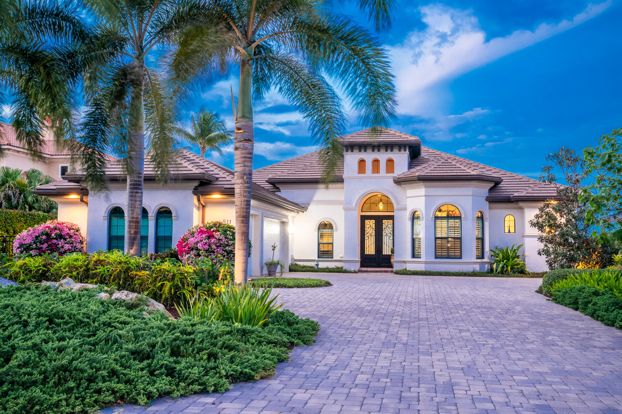 Highly desirable river front pool home in the Hildabrad neighborhood.
Stunning wide water views, backyard and patio for the ultimate Florida lifestyle. Custom built Shearwater model by AR Homes, built in 2019, within walking distance to historic downtown Stuart. 340' dock built in 2018, with power and water. No fixed bridges. Cleveland Clinic is 2 blocks away. Storm shutters installed over impact windows for ultimate protection, whole house generator with 500 gallon propane tank. Hardwired, monitored security system. Large pool with gas heater, putting green, fire pit area, custom built outdoor kitchen. Circle drive provides ample parking. Two HVAC's, mini-split A/C in garage, Versalift and pull down stairs added in garage for ease of storage. Professional landscape and hardscape, no lawn to water or mow, all drip irrigation via well.
A paradise awaits...

The information provided herein including but not limited to prices, measurements, square footages, lot sizes, calculations and statistics have been obtained and conveyed from third parties such as the applicable Multiple Listing Service, public records, owner, seller, as well as other sources. All information including that produced by the owner, Seller, Listing Company, or Listingly are subject to errors, omissions or changes without notice and should be independently verified by any prospect for the purchase of the Property. The owner, Seller, Listing Company, and Listingly expressly disclaim any warranty or representation regarding all information. Any prospective purchasers' use of any information is acknowledgement of this disclaimer, and that the prospective purchaser shall perform their own due diligence. Prospective purchasers shall not rely on the information contained herein when entering into a contract for sale and purchase.