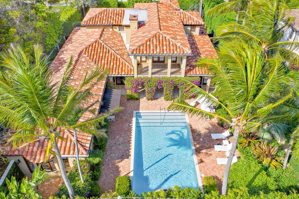 Capture the sea breezes from this exceptional Mediterranean villa located on the desirable ocean block of Brazilian Avenue. This well-appointed meticulously maintained home has an intuitive layout with generous room sizes and an ideal floor plan. Highlights include inviting entertainment spaces, a large first floor master bedroom suite with double baths and closets, library/den, media/play room, office and an eat in kitchen with butler's pantry and French doors that open to the lanai and pool from all main rooms. The property is fully hedged for privacy with lushly landscaped grounds and has a sun drenched serene backyard with large pool and spa. Situated just four houses from the beach yet right around the corner from Palm Beach's finest shops, restaurants, galleries and clubs. DISCLAIMER: The written and verbal information provided including but not limited to prices, measurements, square footages, lot sizes, calculations and statistics have been obtained and conveyed from third parties such as the applicable Multiple Listing Service, public records as well as other sources. All information including that produced by the Sellers or Listing Company are subject to errors, omissions or changes without notice and should be independently verified by any prospect for the purchase of a Property.  The Sellers and Listing Company expressly disclaim any warranty or representation regarding all information.  Prospective purchasers' use of this or any written and verbal information is acknowledgement of this disclaimer and that Prospects shall perform their own due diligence.  Prospective purchasers shall not rely on any written or verbal information provided when entering a contract for sale and purchase.  Some affiliations may not be applicable to certain geographic areas. If your property is currently listed with another agent, please do not consider this a solicitation for the listing. In the event a Buyer defaults, no commission will be paid to either Broker on the Deposits retained by the Seller.  "No Commissions Paid until Title Passes."  Copyright 2020 Listing Company. All Rights Reserved.