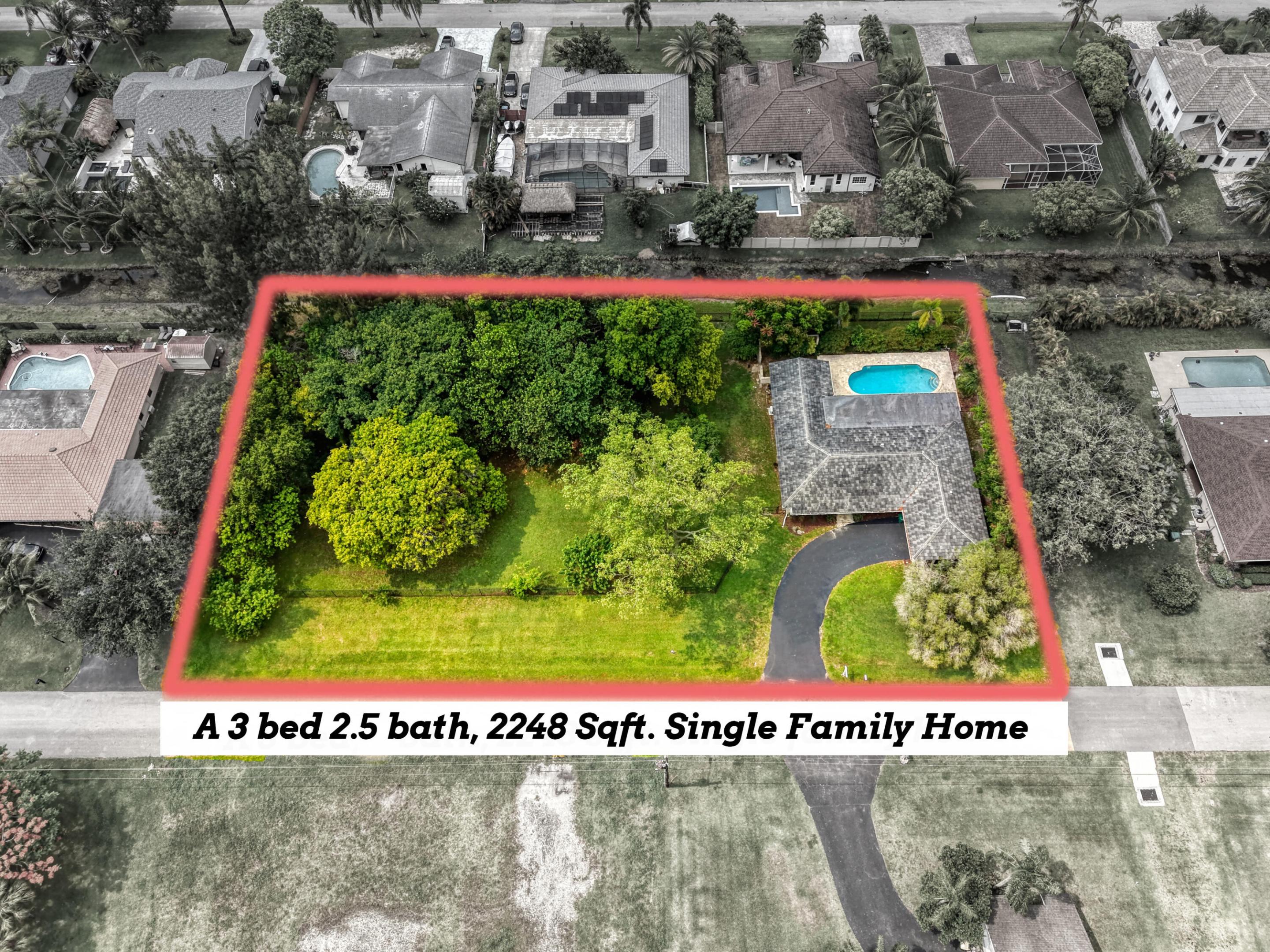 A rare offering in Plantation Acres — this 3 bedroom, 2 bathroom residence sits on over an acre of prime land, delivering unmatched potential for customization, your very own private pond, expansion, or luxury outdoor living. The property features a refreshing pool, expansive green space, and the kind of lot size that simply doesn't come around often. Whether you're envisioning a modern estate, equestrian amenities, or a private resort style oasis, this property provides the canvas to bring your vision to life. An incredible opportunity in one of Plantation's most coveted neighborhoods.