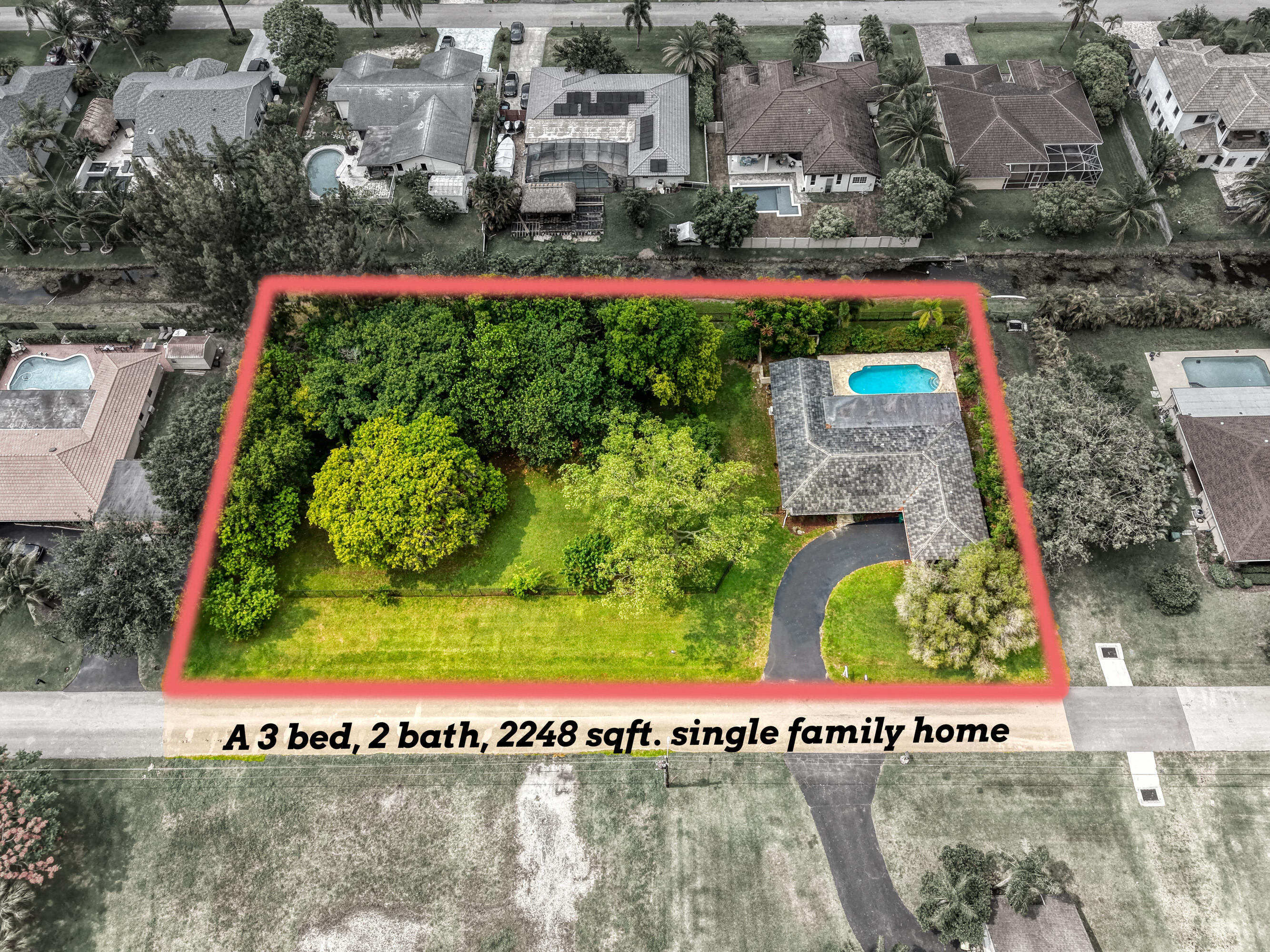 A rare offering in Plantation Acres — this 3 bedroom, 2 bathroom residence sits on over an acre of prime land, delivering unmatched potential for customization, your very own private pond, expansion, or luxury outdoor living. The property features a refreshing pool, expansive green space, and the kind of lot size that simply doesn't come around often. Whether you're envisioning a modern estate, equestrian amenities, or a private resort style oasis, this property provides the canvas to bring your vision to life. An incredible opportunity in one of Plantation's most coveted neighborhoods.