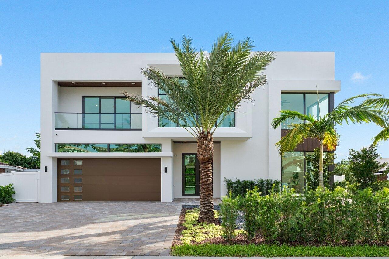 Your Dream Home Awaits! Built by Primo Construction Designed by Arianna Tascione. Nestled in the prestigious Boca Villas, just steps from the pristine beaches, this Bespoke property is a true masterpiece.This impressive 5,645 living square feet on an oversized 10,297 square foot corner lot, this luxurious residence offers an unparalleled lifestyle in the heart of Boca Raton. Step inside this exquisite five-bedroom, five-bathroom home, where elegance meets functionality. The spacious layout features an elevator for access to the second level and a separate cabana bath, ideal for hosting guests. The outdoor area is a true entertainer's paradise, complete with a fully equipped outdoor kitchen, expansive covered porch, and beautifully landscaped grounds. Culinary enthusiasts will fall in lov with the double island kitchen, featuring a walk-in pantry & two laundry rooms for ultimate convenience. State-of-the-art LED lighting throughout enhances the ambiance, with top-of-the-line kitchen appliances. Retreat to the large master suite, which boasts its own private balcony, offering serene views of the surrounding area. Enjoy the added luxury of a dedicated bar area complete with a refrigerator and icemaker, perfect for unwinding after a long day. This exceptional property seamlessly combines luxury and comfort, making it the perfect family home or an entertainer's dream. Don't miss the opportunity to make this stunning Boca Raton residence your own!