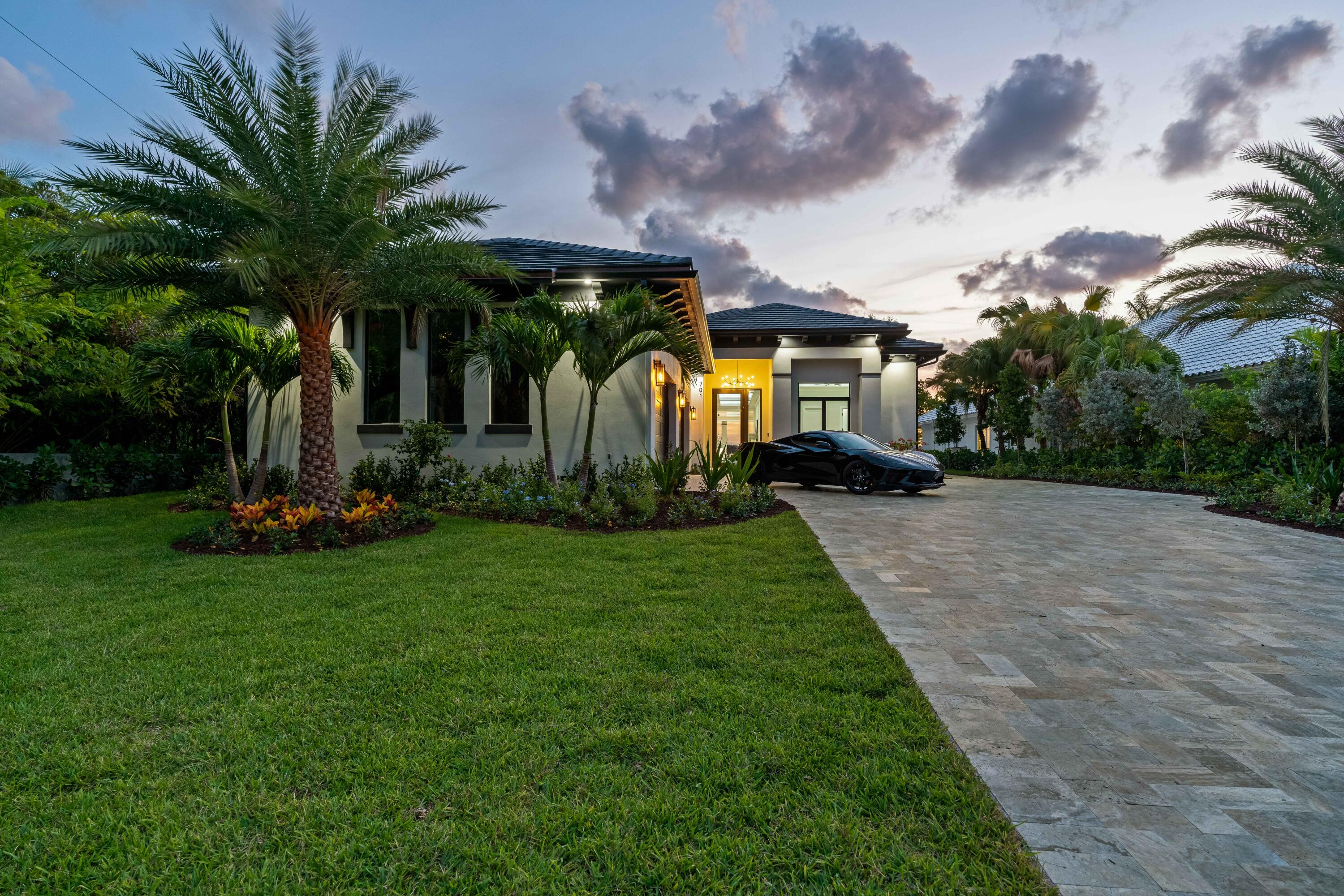Brand new construction on Hypoluxo Island with insane wide Intracoastal views, deep water and direct ocean access with no fixed bridges! Stunning modern contemporary design offering 5 bedrooms, 6.5 baths, plus huge 4 car garage, an expansive saltwater pool and outdoor entertaining area. Enjoy a summer kitchen under the large loggia, waterfall from the poolside cabana and infinity edge spa and sundeck. Beautiful kitchen with entertainment bar, backlit Cristallo countertops, Thermador appliances and walk-in pantry. Floor plan offers private elevator, first and second floor master suite options, two first floor guest suites, spacious formal dining room and bonus/media/optional 6th bedroom along with an additional upper guest suite. Designed by High Tide Waterfront Properties and YRA Design.