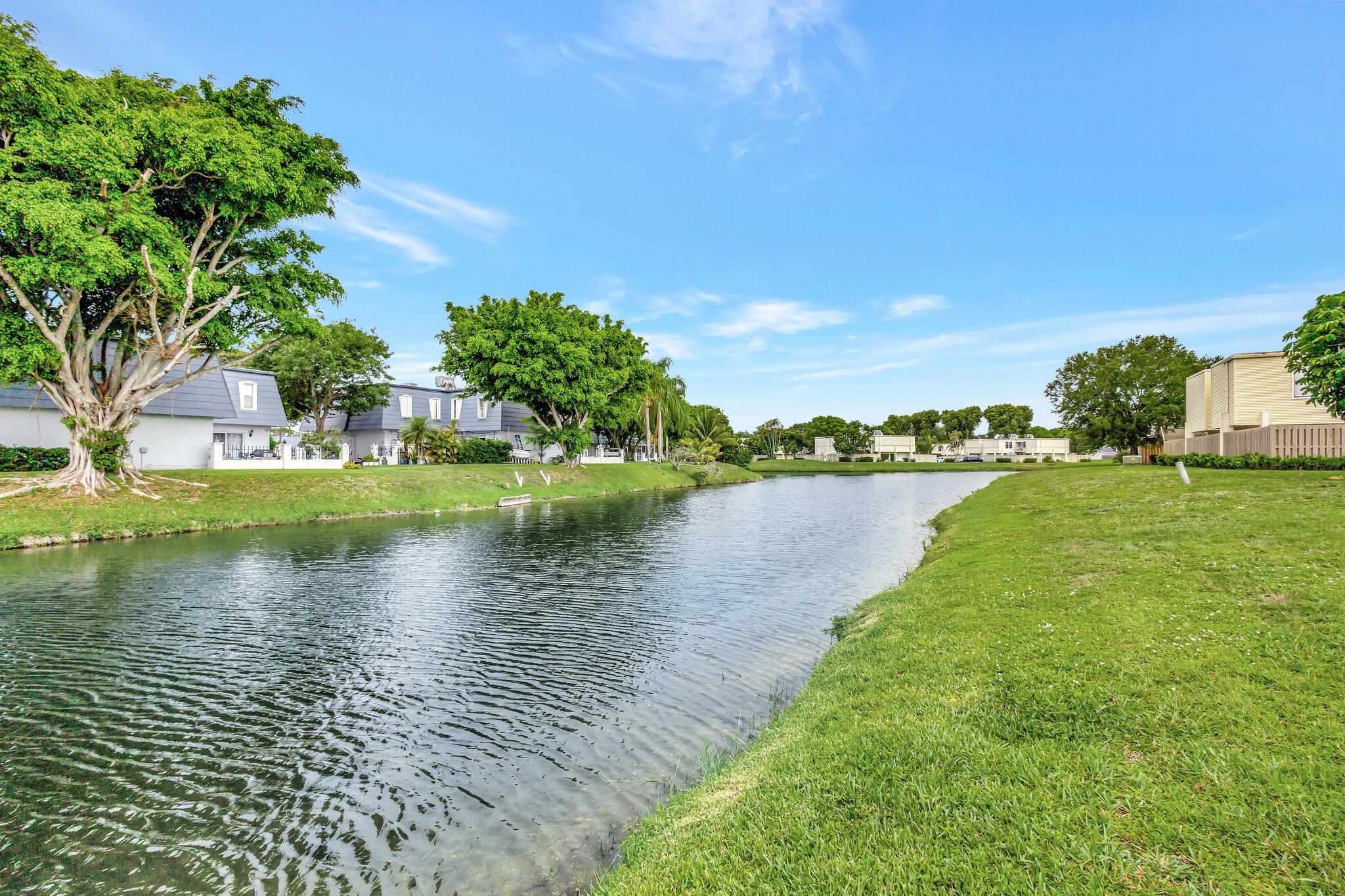 Charming 3-Bed, 2.5-Bath townhome with serene water views from every bedroom in the heart of Wellington! Located in an A+ school district and minutes from shopping, the Village of Wellington's Aquatics & Community Center, and major equestrian venues. Features Mexican tile downstairs, wood-look vinyl upstairs, a private courtyard, and a kitchen with stainless steel appliances. Perfect as a full-time home or income-producing property, with flexibility for annual or short-term rentals. Near polo and equestrian events, the area attracts seasonal visitors, creating strong rental demand and excellent investment potential.