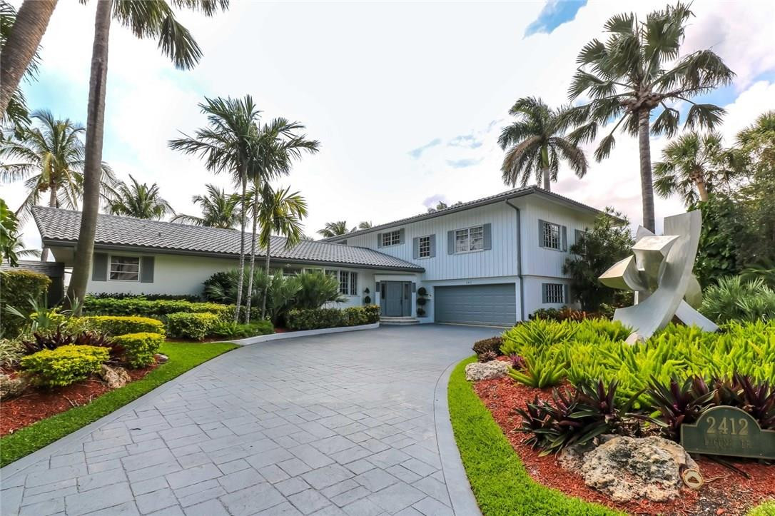 This island-feel home is nestled between the sparkling private beach of the exclusive Harbor Beach community and the bustling everyday boat parade of the Intercoastal Waterway. Features include an over sized deck, boat lift & dock, pool. Interior art, exterior art and all sculptures excluded. This home sits directly on the ICW with 120 ft of idle speed - no wake water for your boating and viewing pleasure. Beautiful sunsets and city views. Similar to a Point View.