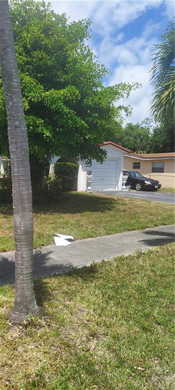 WOW!!! A BEAUTIFUL 2 BEDROOMS AND 1 BATHROOM SINGLE FAMILY HOUSE WITH LOTS AND LOTS OF LAND SPACE FOR THE ENTIRE FAMILY TO ENJOY. THIS HOUSE HAS A NEW AIR CONDITION UNIT,UPGRADED KITCHEN ,A FULL WASHER AND DRYER, AN ENCLOSED GARAGE, NEW IMPACT WINDOWS AND MUCH MUCH MORE. YOU GOT TO MOVE FAST, THIS PROPERTY WILL NOT BE ON THE MARKET FOR TOO LONG. THIS PROPERTY IS VERY CLOSE TO THE AIRPORT,SWAP SHOP, MALLS, MAJOR ROADWAYS AND HIGHWAYS,SAWGRASS MALL,RESTURANTS AND MUCH MORE. DON'T DELAY, CALL TODAY. PROPERTY HAS A CLOSED OUT PROBATE.