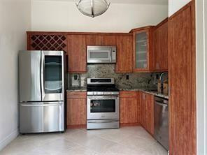 Beautifully renovated 3/2 home in a quiet family neighborhood. This home features a brand new S-title roof (2023), impact windows and doors, tile flooring throughout, updated kitchen with stainless steel appliances, remodeled bathrooms, Culligan water softener & filtration system, 220V installed in garage for EV charging. Large fenced in backyard. Generac whole house generator. Newer Trane AC system with UV light. Newer Water Heater. New Interior & Exterior paint. Close proximity to schools. Low monthly HOA maintenance fee covers community facilities such as clubhouse, swimming pool, and tennis court. Easy access to Sawgrass Expressway.