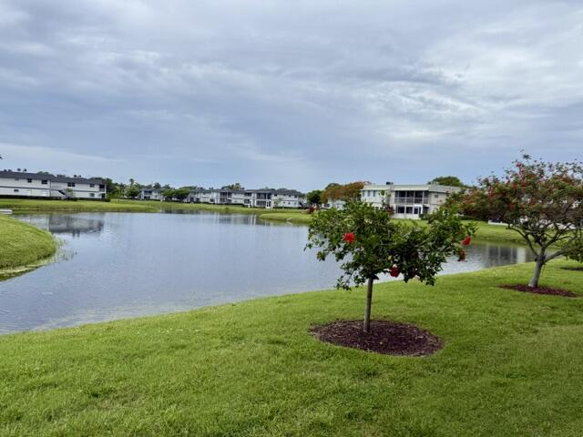 MAJOR PRICE IMPROVEMENT!! Private Lakefront Beauty — This One Won't Last This beautifully kept 2 bed, 2 bath corner unit in Kings Point offers rare privacy with no neighbors directly connected on either side and serene lakefront views right outside your back patio. Enjoy updated flooring, a modern kitchen, and refreshed bathrooms in the heart of Delray's vibrant 55+ community with amenities galore.  The home is move in ready and sold fully furnished, including small kitchen appliances, plates, glasses, pots, pans, and cutlery—perfect for effortless seasonal or full time living. With no pending assessments and priced to sell, this is an opportunity you don't want to miss. Don't hesitate—this one won't last long.