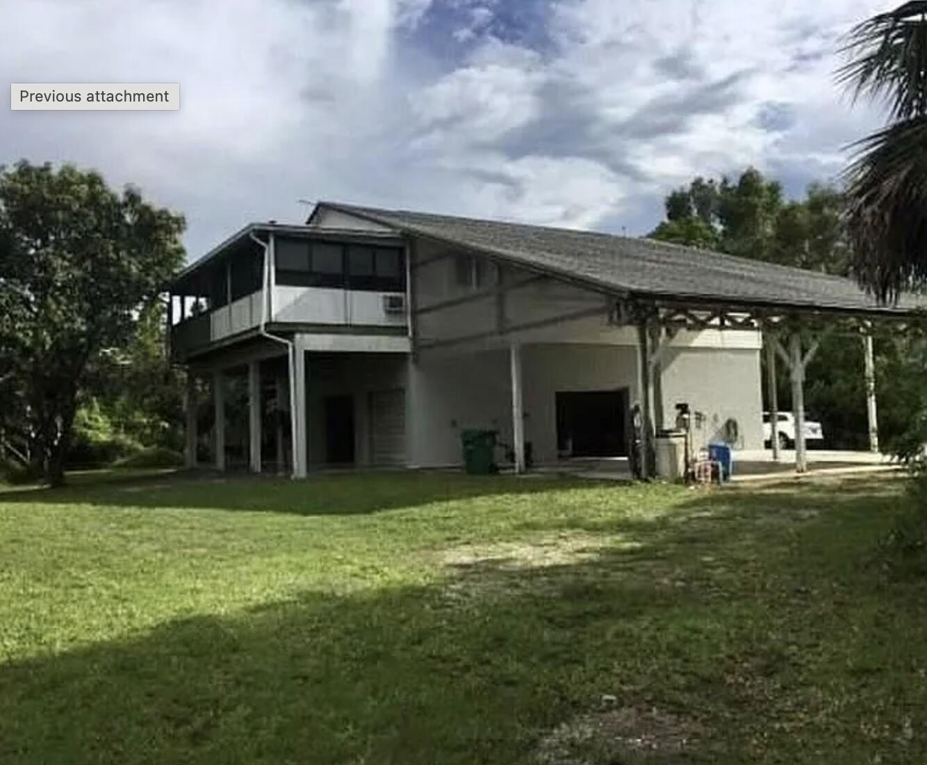Live in Paradise: Walk to shops. PRIME LOCATION: Private 2.85-acre forest oasis, just 1,500' east of US1. Ample space for boats, RVs, and cars. HUGE POTENTIAL: Income Generating: Currently brings in $5,000/mo ($2,400 from 2 downstairs efficiencies + $2,600 from 3/1 upstairs). Business Opportunity: Live & work, or develop commercially. Structure: 2-story building with a 3/1 main unit (huge kitchen, screened patio) and two separate 1st-floor efficiencies. Storage/Workshop: Large interior workspace/garage plus a massive 4+ car covered garage with a dedicated RV sewer line. Tremendous potential for multi-family, rental income, or home-based business! DO NOT disturb tenants or visit without supervision.