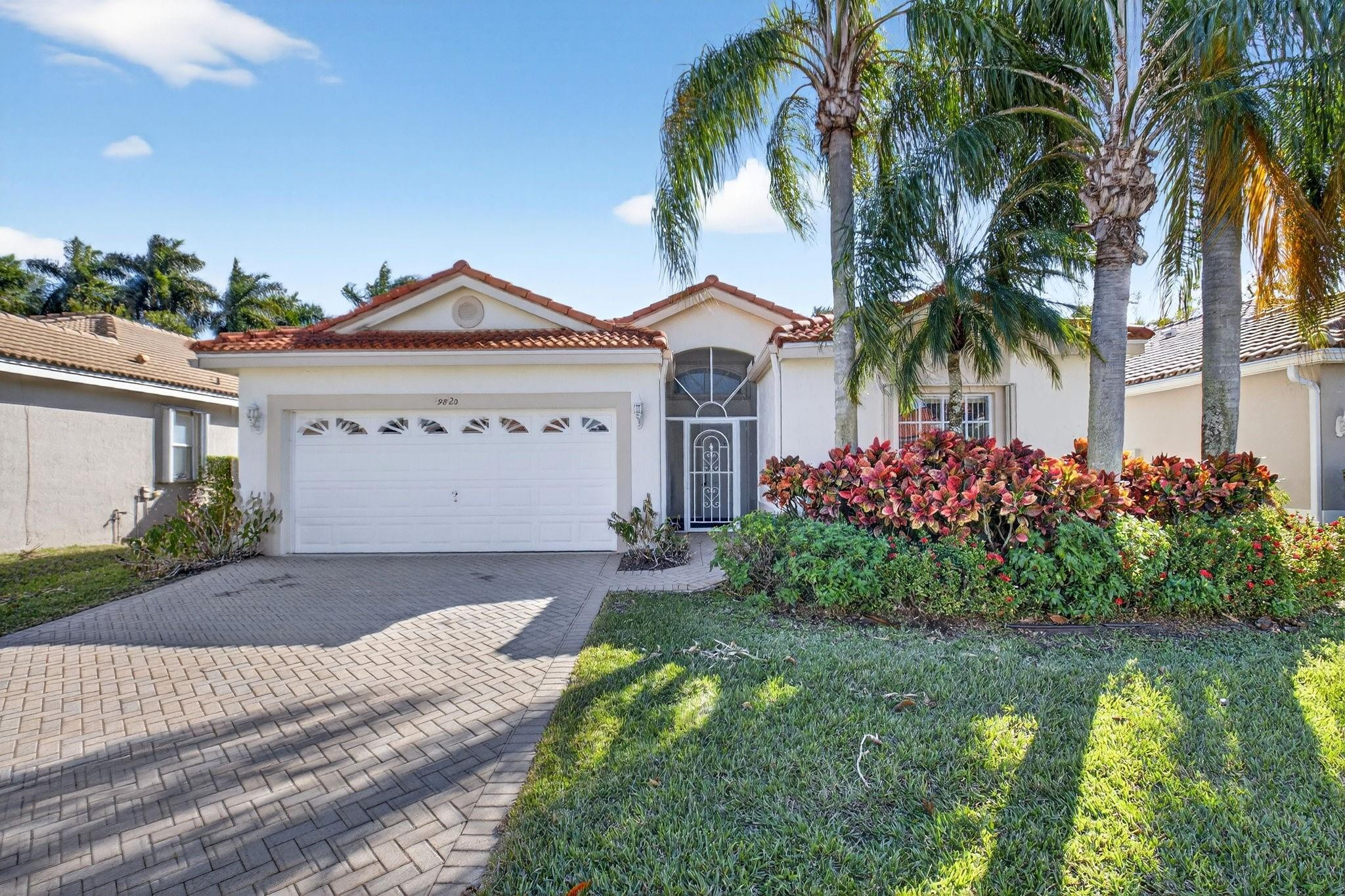 Welcome to resort-style living in The Grove, a premier 55+ gated community in Boynton Beach! This beautifully maintained 3-bedroom, 2-bath home offers just under 2,000 square feet of comfortable living space designed for both relaxation and entertaining. Roof replaced in 2018 for added peace of mind. Enjoy a spacious layout with generous living areas and abundant natural light. The Grove features a newly renovated clubhouse, fitness center, ballroom, card rooms, library, heated pool and spa, tennis, pickleball, bocce, and countless social clubs and activities. 24-hour manned gate and prime location near shopping, dining, and major highways complete this exceptional lifestyle opportunity. All meas. approx.; info deemed reliable but not guaranteed; Buyer/Buyer’s Agent to verify.