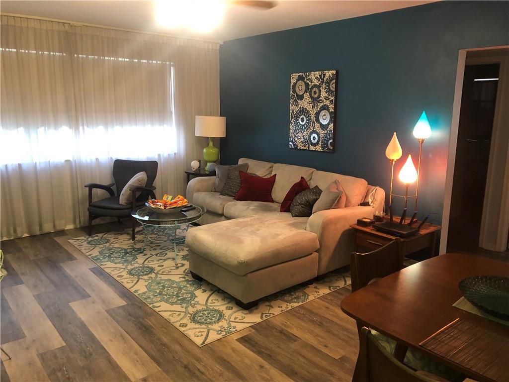 Immaculate GROUND FLOOR Corner Unit in Well maintained complex-Parking next to unit- Laundry steps from unit-Imperial Point Neighborhood-Beautiful New Flooring throughout unit-AC and Hot water heater are newer-Unit is fresh and well-done so you can move right in! All cash required, no rentals during first 2 years of ownership-BEST VALUE IN NE Ft Lauderdale ! Will not last