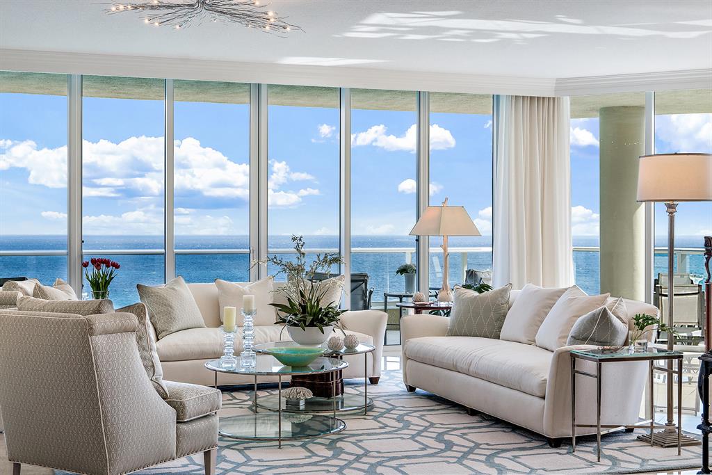 Incredible Direct Ocean and Intracoastal Views from Every Room! With nearly 5,000 sq ft of living space no detail has been over looked! Enjoy oversized wrap-around private terraces to take-in the ocean sunrise and stunning sunsets! Located in a boutique-like building with only 40 residences, this paradise in the sky is being offered fully furnished~turnkey; so, pack your bag and head to the Ocean this winter! Property includes a private pool-side cabana w/ full bath/shower, cable ready TV, wet bar/refrigerator with custom cabinetry & marble flooring. This tower suite possesses 4 bedrooms and 4 and ½ baths with over 10' ceiling heights, crown moldings, coffered ceilings and recessed lighting throughout. Gather around a large island flowing into a casual dining/breakfast... See Supplement... area surrounded by ocean views! Some additional features include impact energy-efficient windows & doors, chef-inspired gourmet kitchendesigned with European-style cabinetry w/ undercabinet lighting, granite counter tops and backsplash, top of-the-line stainless steel appliances including a subzero refrigerator/freezer, Miele double wall ovens w/steamer & warming drawer, a built-in espresso machine, 5 burner natural gas Wolf cook top & microwave. Relax at your poolside cabana making Ocean's Edge the perfect location for a coastal lifestyle. Singer Island is conveniently located just minutes from fantastic restaurants & shopping in Palm Beach County with easy access to Palm Beach International Airport! Call today for your private showing!
Owning a condo in Ocean's Edge grants residents and their guest's unlimited access to the elite resort-style amenities equipped with an oceanfront heated pool and spa with a few private cabanas and an outdoor barbecue area, state-of-the-art fitness center, 24 hour gated entry and concierge services. This community is the perfect setting for entertaining with a stylish oceanfront social room, a plush theater perfect for watching a movie or the big game with your family and friends. Ocean's Edge is one of the most desirable properties on Singer Island!