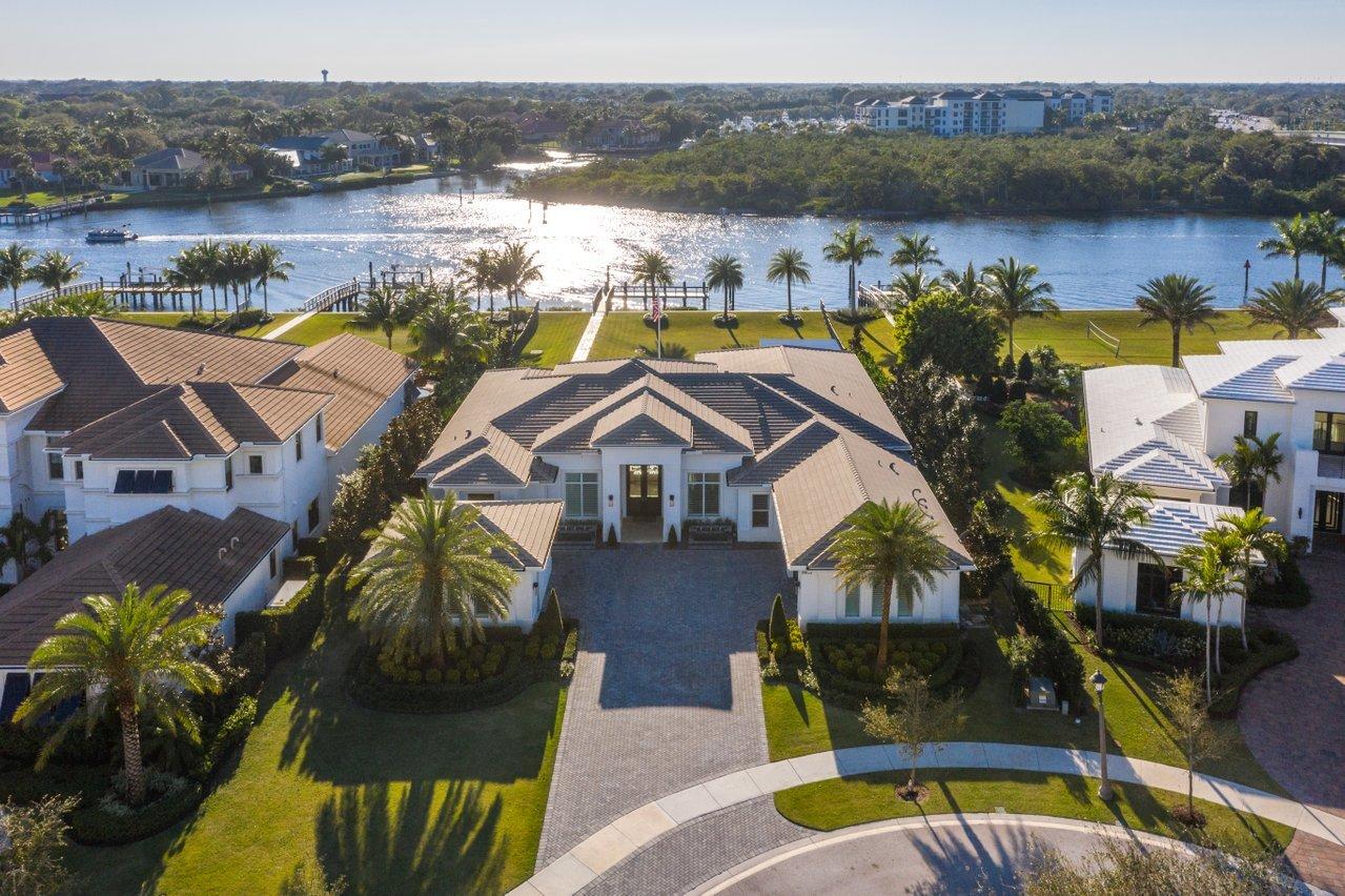 Paradise Found! Offered Furnished & has a Guest House! No expense was spared on this gorgeous waterfront home located in desirable gated community of Frenchmans Harbor. From the minute you walk into the front door you have sweeping direct Intracoastal wide water views, in a no wake zone w/ no fixed bridges. Enjoy all that South Florida has to offer 365 days a year. Custom finishes throughout. Some of the many features include impact windows/doors, full house generator, gorgeous kitchen that anyone would love to cook in w/ top of the line appliances, a gas cooktop, sub zero wine fridge just to name a few. Entertain at your wet bar just off the kitchen & living room or outdoors on your oversized covered patio w/ summer kitchen, phantom screens & custom outdoor Pergola w/ solar powered roof. All of this while enjoying the Florida lifestyle relaxing by your custom heated pool overlooking your large back yard, watching the boats go by. This home is a must see to truly appreciate everything it offers...



Here are some additional features:

Main House: 3BR + Study + Gym 4 full & 2 half BA, 3CG 4625 SF Detached Guest House: 1 BR, 1 BA 481 SF
5106 Total Living Area (w/ Guest House) I 6760 Total Area
-impact windows
-invisible screen (patio)
-heated pool/spa
-salt system for pool
-whole house generator
-plantation shutters throughout
-surround sound inside and outside
-security cameras throughout
-summer kitchen with gas grill, ice maker, fridge
-marble flooring throughout common areas
-48" sub zero refrigerator/freezer, sub zero wine fridge, wolf gas cooktop
-crown molding and 7 1/4" baseboard throughout, wood casings in all entryways
-outdoor gas line for firepit
-custom dock lighting
-custom outdoor landscape lighting controlled by Lutron system
-custom master closets with accent lighting
-2 custom wood wine cabinet displays
-custom wood breakfast seating
-custom mudroom cabinetry
-custom silestone countertops
-cabinets to ceiling in kitchen
-custom linen cabinet and makeup vanity in master bath
-wetbar with 2 sub zero under counter refrigerators
-custom tongue and groove ceilings in family room and covered patios
-custom outdoor pergola with solar powered roof
-custom accent wall in family room and master bedroom
-custom ceilings in master, dining, and living room
-Custom outdoor entry fountains with lighting
-oversized master shower for 2
-stone tub in master
-high end indoor lighting fixtures and indoor/outdoor Haiku fans
-blackout shades in study and master
-custom fitness center with rubber flooring, wall to wall mirrors, and cabinetry
-custom cabinetry and epoxy flooring in 3 car garage
-separate in law suite with full bath, 2 closets, and kitchenette
-additional attic storage with reinforced flooring and pulldown ladder
-custom walk in pantry
-his/hers water closets
-custom window treatments In master bed/bath, living room, and family room
-trex flooring system for dock


*Information deemed reliable but not guaranteed.