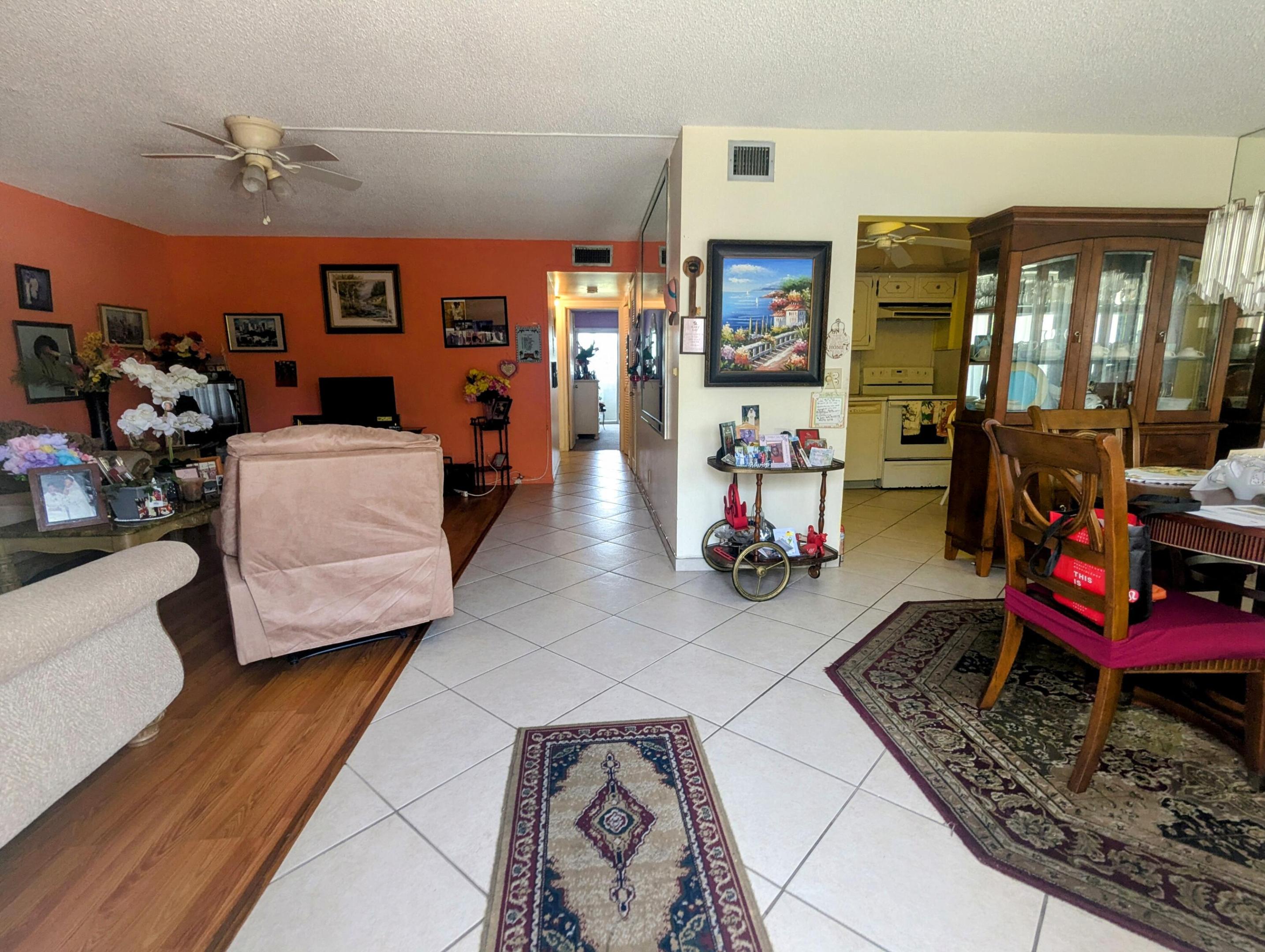 55+ Century Village -1,062 square feet 2-bedroom, 2 bathroom condo. New AC installed 7/2026. Needs TLC, Priced for Immediate Sale. No Rentals**No Investors! 55+ resort living in the highly desirable Wellington section of Century Village! This second-floor condo features effortless elevator access and a serene, calming lake view right from your windows. This particular neighborhood offers an exclusive upgrade that sets it apart: access to two private, resident-only swimming pools reserved specifically for Wellington community members. Beyond your peaceful local enclave, you are just steps from the legendary main clubhouse. Enjoy an active lifestyle featuring a 92,000-square-foot facility, a 1,221-seat live performance theater, a state-of-the-art fitness center, tennis, and pickleball.  Complete with a free local courtesy shuttle bus and a 24-hour guarded gate, this neighborhood perfectly blends privacy, top-tier security, and endless activities