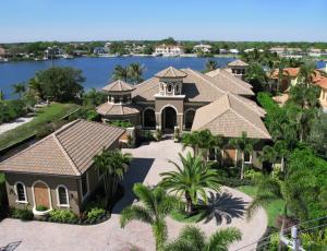 Spectacular Estate with wide water views. Elegant top of the line interior features are highlighted by 2 professional indoor bowling lanes, yes we said bowling lanes. Indoor outdoor living is as one with awesome sunset views and spacious exterior living area. Main house contains an enviable master with 2 more gracious sized rooms. Guest house contains 4th bedroom. No showings until after December 25 please