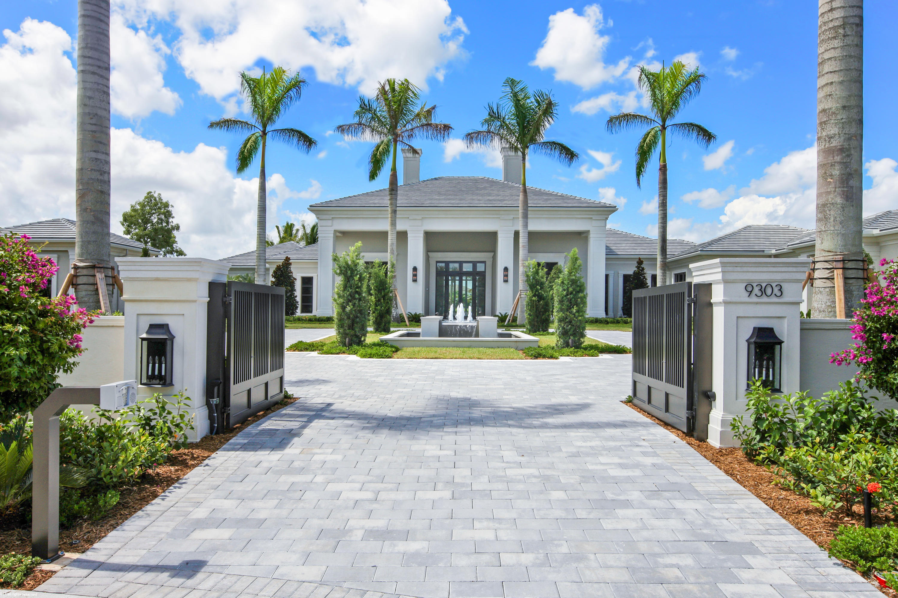 This 2.5 acre cul-de-sac home site features a 5 BR/6.2 Bath home with expansive lake views from nearly every room in the house.  Newly constructed, this home will be completed August 2017 by premier custom home builder Courchene Development, known for their high level of quality and attention to detail.  This “smart” home is equipped with a Crestron home automation and lighting system, an exterior camera system, and a club room featuring a 159” screen and projector.  Other features include impact window throughout, Sub Zero and Wolf appliances, marble and European white oak floors, built-in shelving for closets and storage, an office with built-in cabinets, a fitness room and a detached pool bath (175sf).  At the covered lanai you will find a built-in grill with island wet bar, outdoor fireplace, and roll down screens for an enjoyable outdoor entertaining area.  A must see! You will be astounded with this beautiful estate home!
