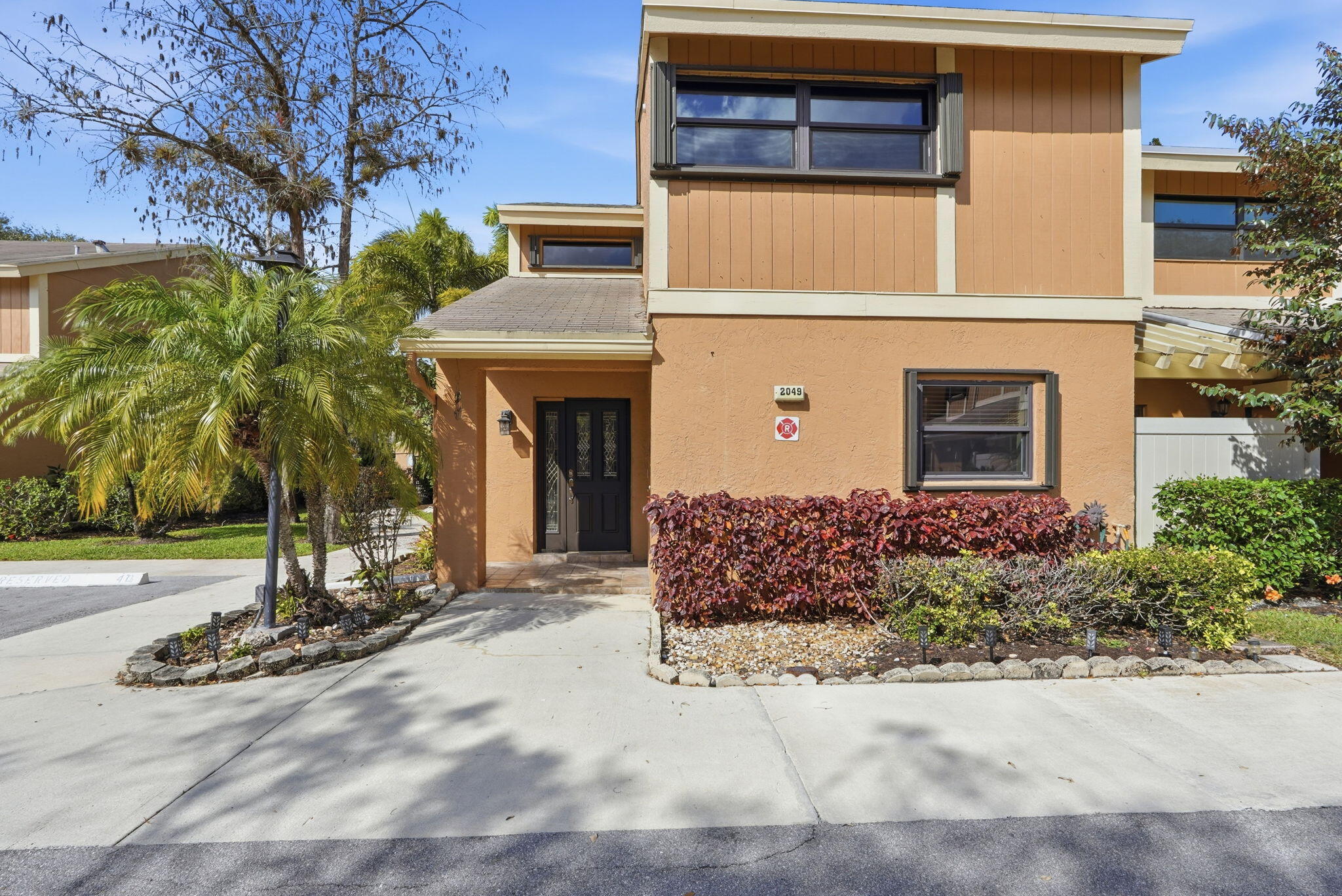 Discover this spacious townhome featuring 3 bedrooms and 2.5  bathrooms, perfect for modern living. The upgraded kitchen boasts  contemporary finishes, ideal for cooking and entertaining. Each bathroom is        beautifully designed, enhancing the home's overall appeal. This end unit provides added privacy and tranquility, while the property backs up to a  serene pool and garden area, offering a peaceful retreat right outside your        door. Enjoy the convenience of two dedicated parking spaces, making it  easy for residents and guests alike. This townhome combines comfort and style in a desirable location, making it an excellent choice for families or anyone seeking a lovely living space. Impact Windows and Front Door in this Cozy Home. *HOA requires 10% minimum down payment.   PRICED TO SELL!!!!  TOWNSHIP INCLUDES:  OLYMPIC POOL, HOT TUB, GYM, PICKLEBALL, TENNIS, RACQUETBALL, BEACH VOLLEYBALL, BALLROOM, THEATRE, BILLIARDS ROOM, PING PONG ROOM, FULL LIBRARY, AND SPACE FOR CARDS OR STUDYING