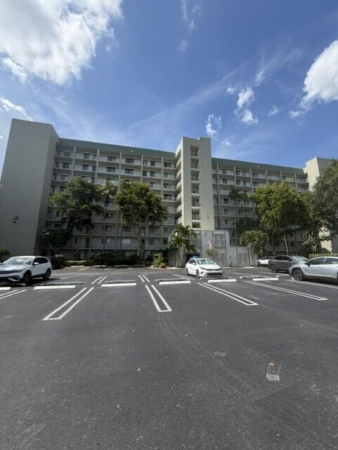 PENTHOUSE LIVING with Lake and Pool views! This 2 bedroom, 2 bath condo offers a spacious and desirable floor plan featuring a primary suite and balcony overlooking the lake and pool area. Enjoy updated flooring throughout with NO CARPET, plus the convenience of a full size washer and dryer located in unit. Ideally located in a sought after community where residents enjoy an execeptional lifestyle with amenities including a clubhouse, fitness center, heated pool and spa, tennis courts as well as bike and walking trails. Conveniently located just minutes from the Isle Casino, shopping, dining and entertainment. A perfect opportunity for year round living or seasonal retreat.