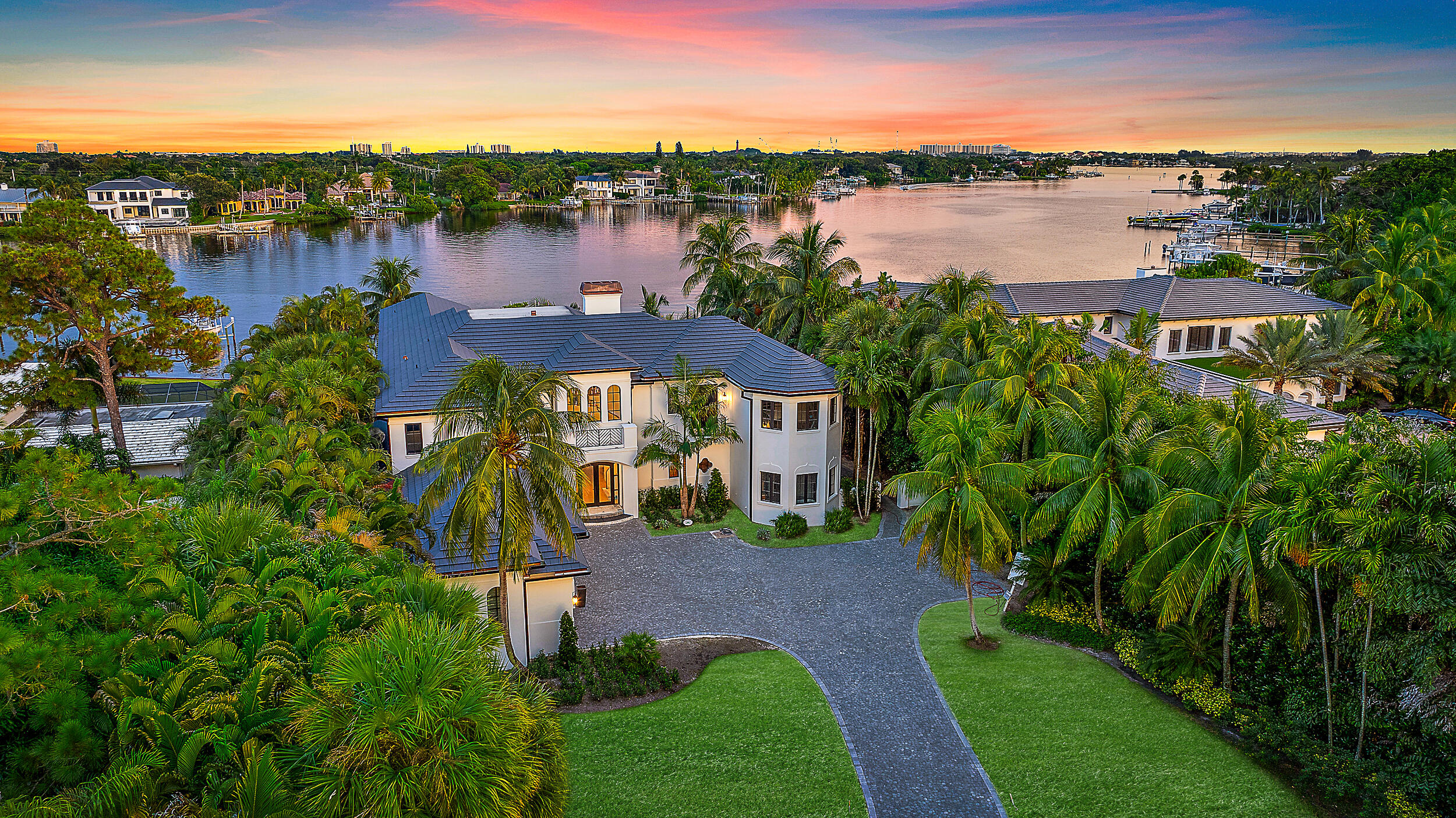 Welcome to your stunning riverfront estate, completely renovated in 2024 by the award-winning Turtle Beach Construction. This exceptional property, located in the heart of Tequesta, offers nearly an acre of land with endless potential. The expansive front yard, accessed by a long, winding driveway, provides ample space for a guest house, garage, or other custom additions.

Inside, the thoughtfully designed layout includes a spacious primary wing with breathtaking water views, oversized walk-in closets, an exercise room, and a private Zen-inspired outdoor shower. A first-floor VIP guest suite ensures comfort and privacy for visiting family and friends. With plenty of space for entertaining, this home is perfect for boating enthusiasts and those seeking a peaceful escape. From the privacy of your riverfront sanctuary to the convenience of nearby shops, dining, and community amenities, this property truly captures the essence of Tequesta living.

Don't miss this unique opportunity to own a piece of paradise!