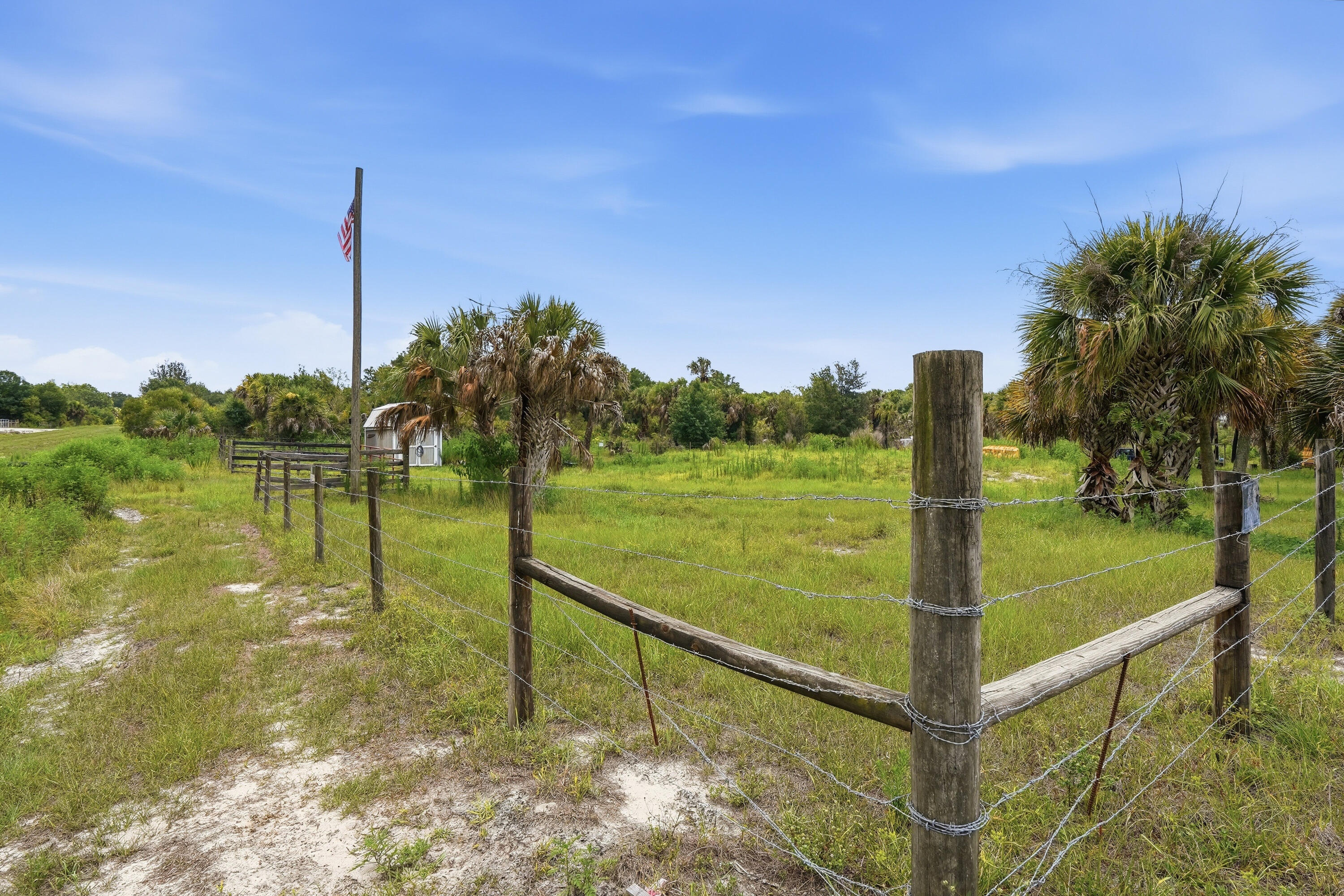Ready to build your dream of country living? This beautiful 1.25-acre parcel already features a prepared house pad, giving you a valuable head start on your future home. Whether you're planning a site-built home or a manufactured home, this property offers the flexibility to create the lifestyle you've been searching for. Enjoy wide-open skies, peaceful surroundings, and plenty of room for a workshop, garden, outdoor toys, or simply space to relax and unwind. Located in Okeechobee's desirable Viking/Prairie area, you'll experience the privacy of rural living while remaining within a reasonable drive of shopping, dining, and everyday conveniences. The shed does not convey. If you've been searching for affordable Florida land with improvements already in place, this is an opportunity you won't want to miss. Come walk the property and start imagining what's possible.