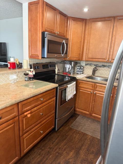 Beautiful 1st floor corner unit, patio view facing golf course. Open kitchen with granite and stainless appliances. 2 full baths, walk in shower, beautifully tiled.  Impact window.