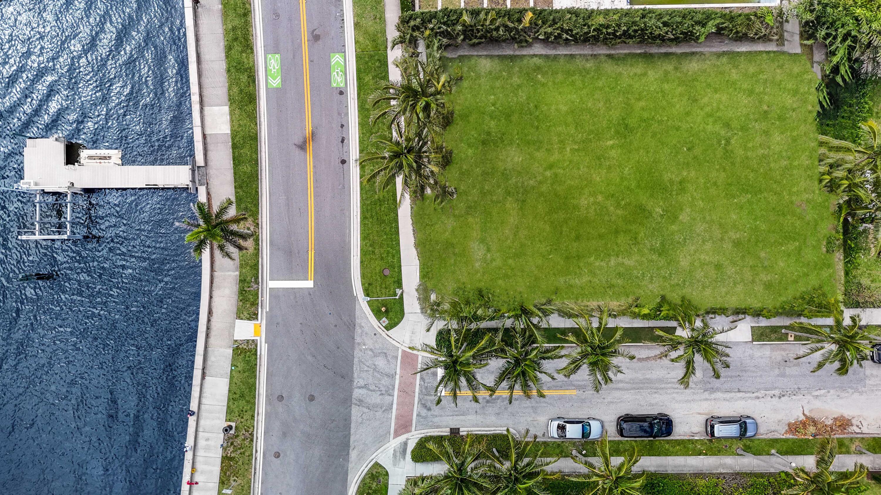 WATERFRONT PROPERTY W/DOCK. Enjoy expansive Intracoastal views from this supremely located parcel near the Southern Bridge to Palm Beach Island across from the Mar-a-Lago Club. Ideal for Boater's, offering a private dock with a 16,000 lb boat lift and separate floating dock for additional water toys.