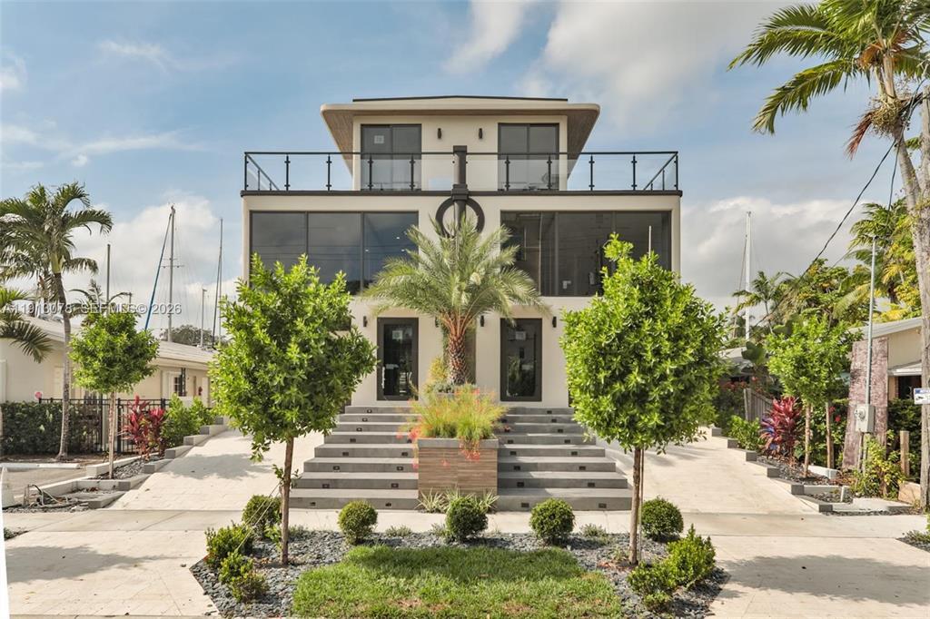 Price Reduced! Submit all offers. Rare opportunity to own the only brand-new waterfront duplex residence on Las Olas Isles . This stunning 4-bedroom, 4.5-bath townhome offers modern luxury, soaring ceilings, open-concept living, and beautiful canal views.  Enjoy a private 52-foot dock with direct ocean access and no fixed bridges, multiple balconies, and a spectacular rooftop terrace perfect for entertaining and watching boats cruise by.  Ideally located just seconds from Las Olas Boulevard's world-class dining, shopping, nightlife, and Fort Lauderdale Beach. An exceptional primary residence, vacation home, or investment opportunity in one of South Florida's most sought-after waterfront locations. This waterfront masterpiece delivers an unmatched combination of location lifestyle,