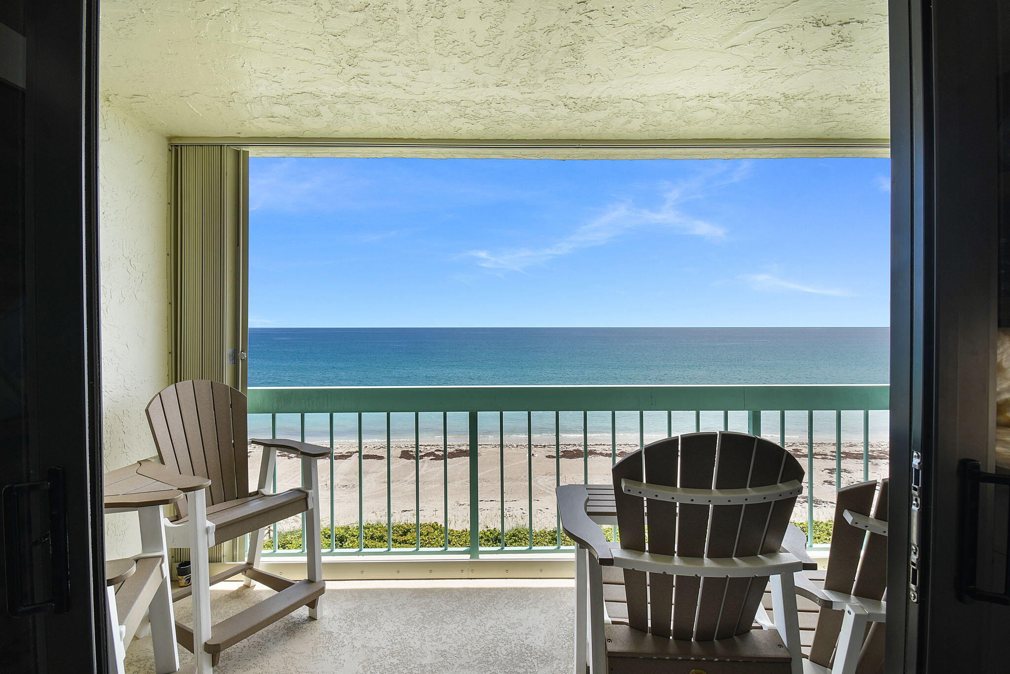 Stunning fully renovated 2-Bedroom, 2-Bath Waterfront condo. Discover your dream coastal lifestyle & wake up to breathtaking waterfront views. Enjoy effortless entertaining with a custom built-in quartzite bar featuring a premium Sub-Zero refrigerator -  This exceptional property offers resort-style living at its finest: •  Direct waterfront location with private beach access •  Tennis courts and pickleball  •  Fitness room •  Two sparkling pools for year-round enjoyment, RV/trailer storage, Salt water spray car wash. Completely updated and move-in ready, this turnkey gem combines luxury finishes with an unbeatable location. Whether you're looking for a primary residence or investment property. Pets allowed. Milestone work completed. No assessments & healthy reserves.