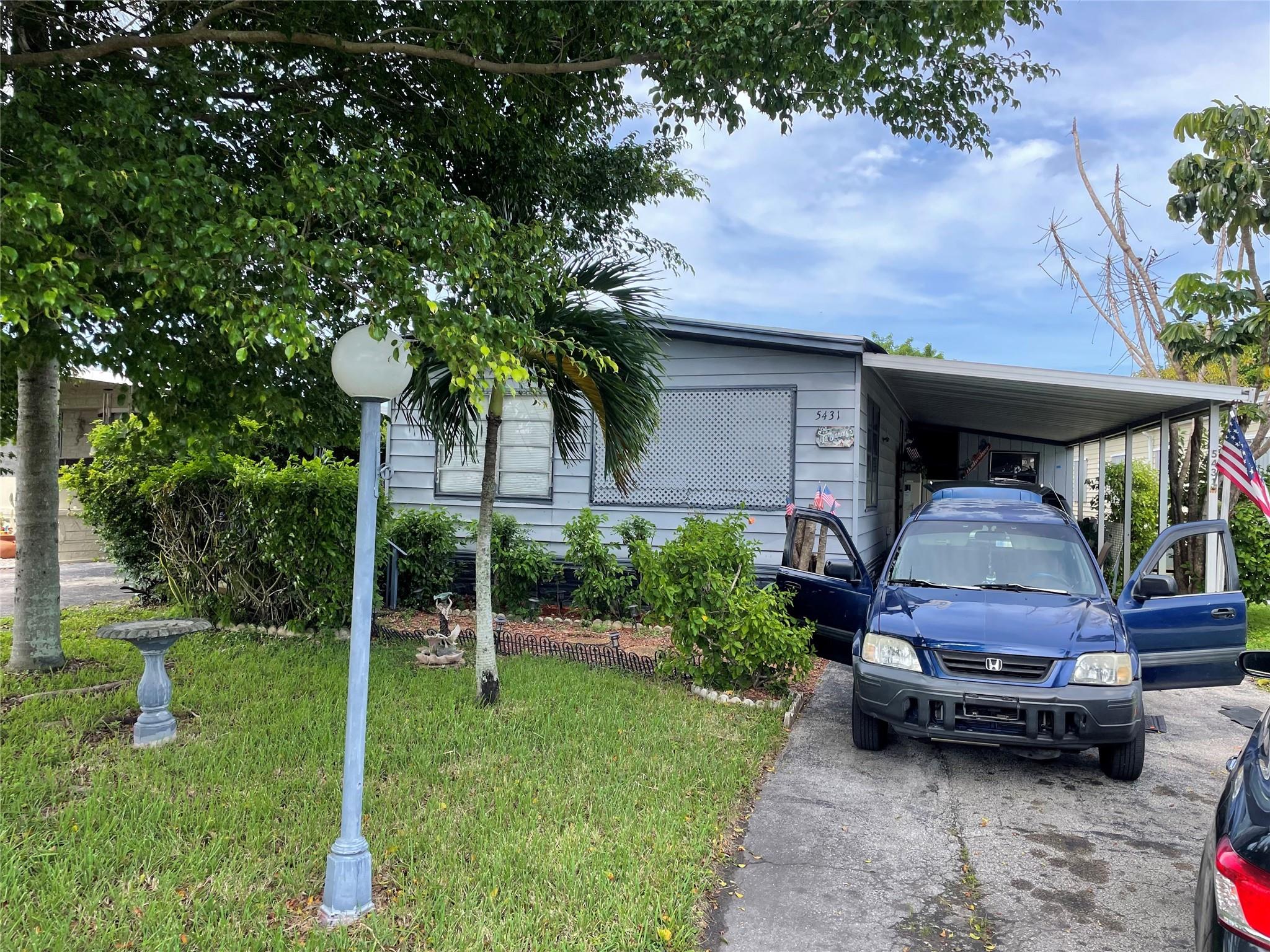 Huge 2/2 doublewide with carport  - shed - -could be 3 bedroom - (Just needs a closet) - -needs TLC, but roof and A/C are newer - - one of the largest homes available - -priced right for quick sale - -Can't rent for 3 years and Association has a $2,500 capital contribution fee charged to buyer at closing