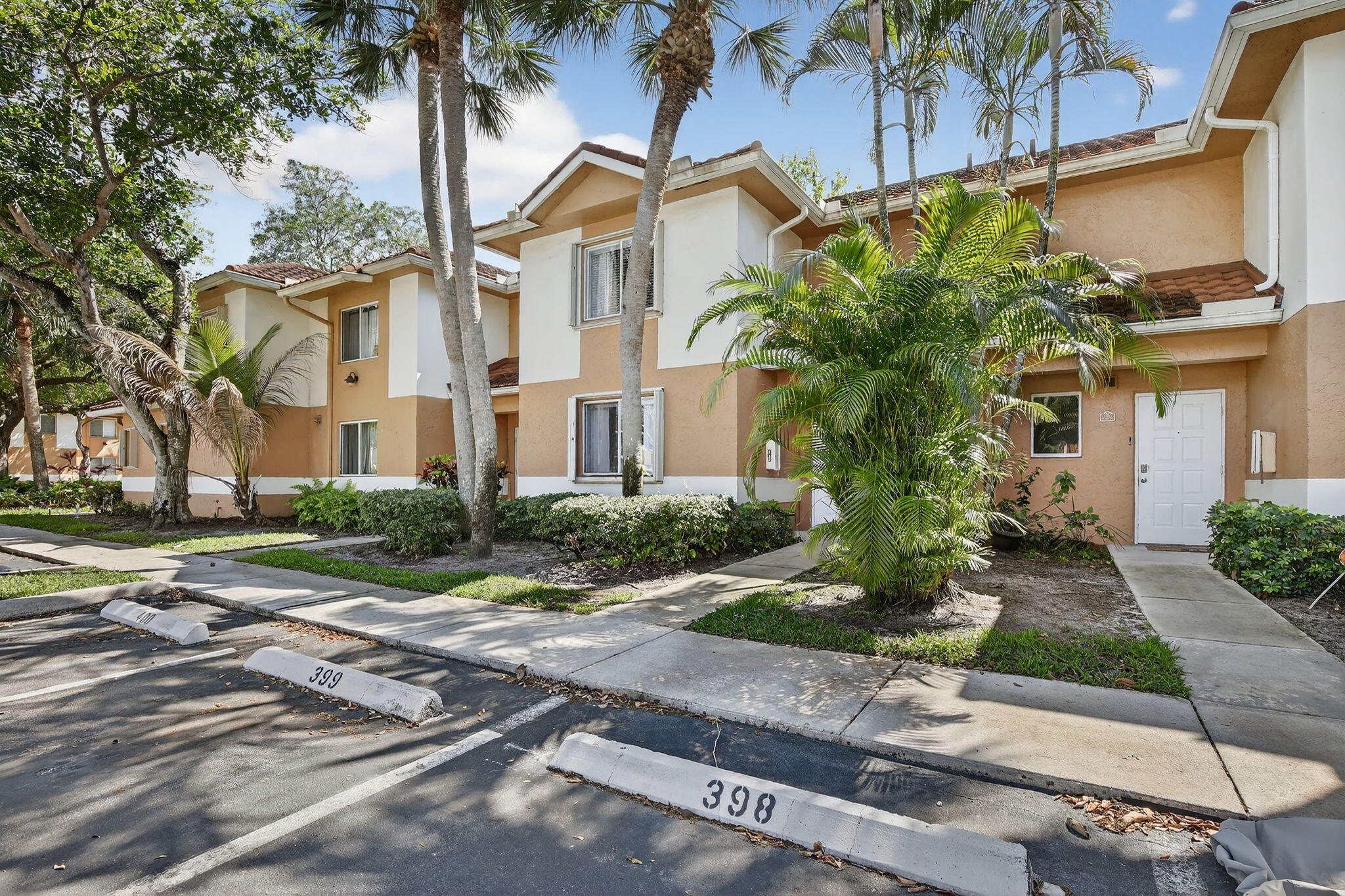 Beautiful 3BR/2.5BA townhome located directly accross from highly desirable Central Park in Plantation. Can be rented immediately. This spacious home features tile flooring on the 1st level, laminate upstairs and an updated kitchen. All three large bedrooms are located on the 2nd level and offer generous closet space.  Enjoy a private glass enclosed patio as an office or sunroom. Impact sliding glass doors and accordion shutters, in unit washer and dryer, AC 2025, Water Heat 2022,parking spaces 401 and 402 in front of unit.  Community ammenites include tennis, pool and gym. Pet friendly neighborhood. Close to shopping, colleges, restaurants and airport. Cash or conventional- Assoc has full reserves.  No assessments, no min credit score
