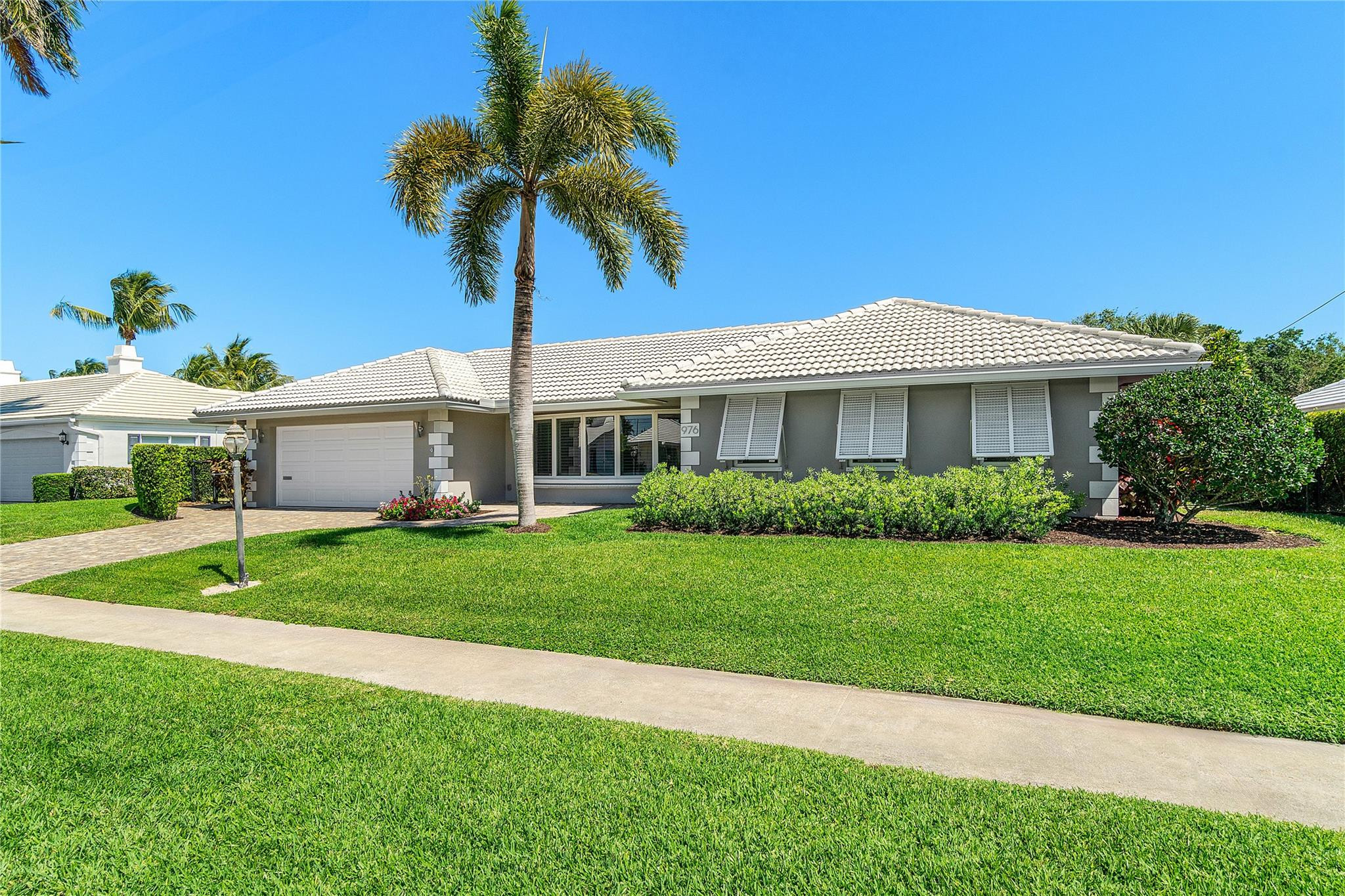 Experience the best of East Boca living at this beautifully maintained, waterfront pool home in the sought-after Camino Gardens neighborhood. Offered seasonally or annually, this residence combines coastal charm, modern comfort, and an unbeatable location. Featuring 3 bedrooms and 2 bathrooms, the home offers a bright, open layout ideal for relaxing or entertaining. Enjoy stunning water views from multiple living areas, a spacious kitchen, and a serene primary suite. Step outside to your private backyard oasis featuring a sparkling pool and 90 feet of waterfront frontage, perfect for outdoor living and boating enthusiasts alike. With fixed bridges and direct ocean access, you can easily navigate from your private dock to the Intracoastal or the Atlantic Ocean.