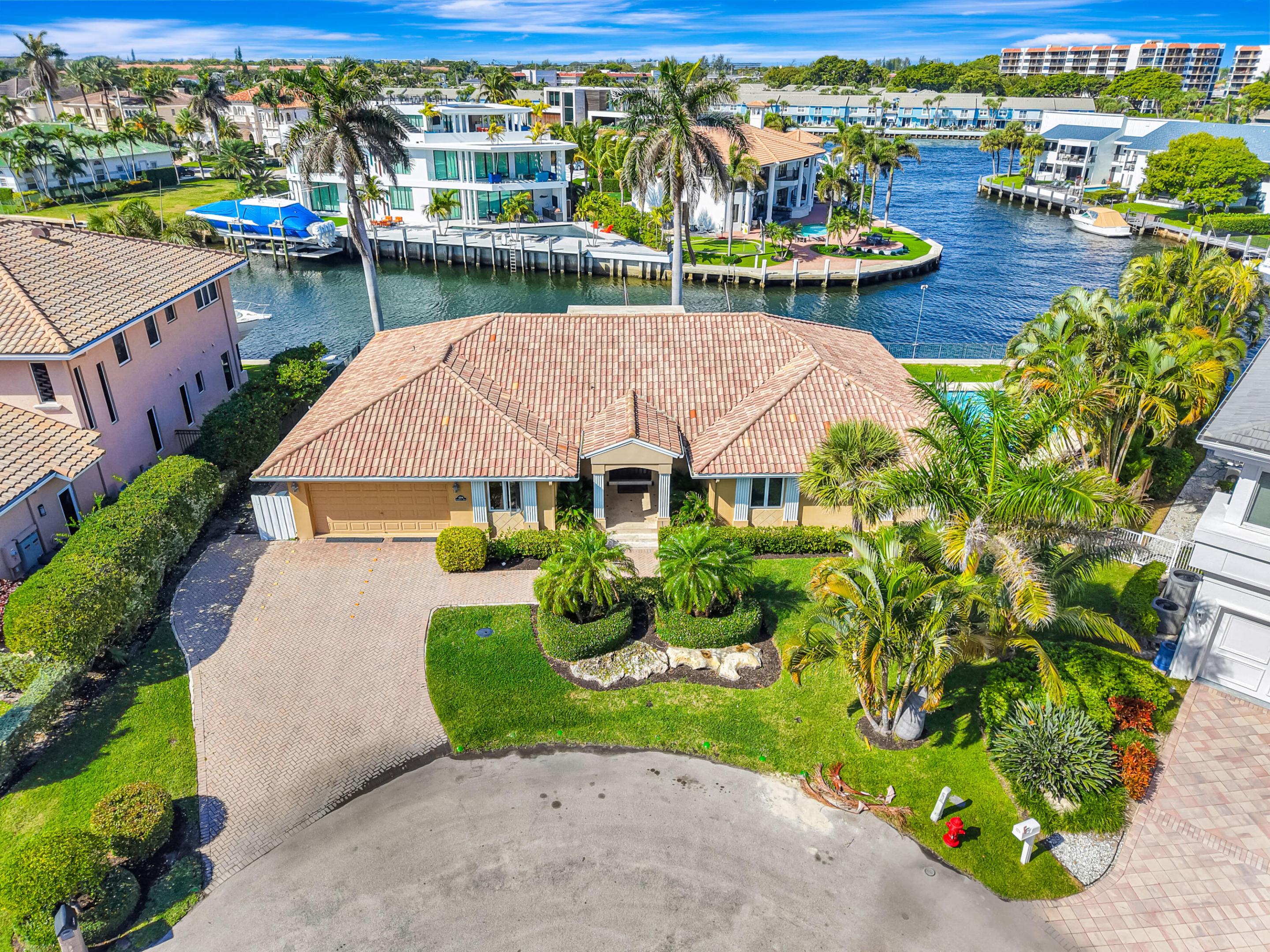 Incredible opportunity to own a waterfront estate home in the highly sought-after Bel Lido of Highland Beach. Tucked away on a cold-a-sac giving the utmost of privacy with 167 feet of water frontage. Enjoy the sweeping Intracoastal views from nearly every room. Experience waterfront living at its finest. 4BR/3.5BA, CBS home with deepwater access & over 3,100 sq ft of living space. Exclusivity with your own deeded beach access creating the best of both boating and beachside living. Features include a spacious layout, all impact glass, Saturnia marble, granite finishes, wood cabinetry, mahogany front doors, abundant closets & storage, and full home generator. A rare Highland Beach opportunity offering privacy, water views, oversized frontage, & the best lifestyle South Florida has to offer. Bel Lido in Highland Beach epitomizes luxury coastal living. Whether you are looking to move right in, or create your own dream home with a rare 167 feet of frontage, this exclusive waterfront enclave boasts exquisite estates with sweeping views of both the Atlantic Ocean and the Intracoastal Waterway. Residents enjoy serene boat docks and architectural masterpieces that showcase complete custom estate homes and exquisite designer finishes. Beyond the homes, life in Bel Lido means a refined South Florida lifestyle: minutes from world-class dining, upscale shopping, and vibrant cultural experiences. Close proximity to Fort Lauderdale airport. Bel Lido offers not just a home, but an unparalleled lifestyle of elegance, convenience, and prestige.