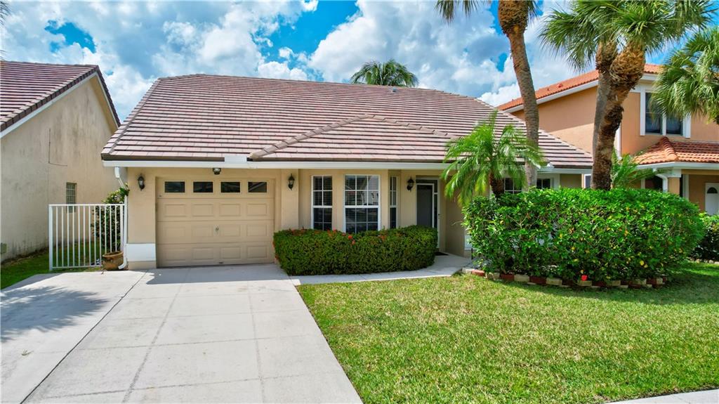 Spectacular Single Family one story home located in Boca Chase, ideally located in West Boca Raton.  The focal part of this home is the kitchen featuring a gorgeous Island.  Perfect for entertaining!   3 Bedrooms and 2 Full Bathrooms.  The large lanai is fully screened.  Granite Countertops, Stainless Steel appliances, ceramic tile and wood laminate flooring througout the home.  Vaulted Ceilings.   One Car Garage.  Amenities include a community pool, tennis courts, basketball & raquetball courts, and community walking, jogging and biking trails. Spectacular Single Family one story home located in Boca Chase, ideally located in West Boca Raton.  The focal part of this home is the kitchen featuring a gorgeous Island.  Perfect for entertaining!   3 Bedrooms and 2 Full Bathrooms.  The large lanai is fully screened.  Granite Countertops, Stainless Steel appliances, ceramic tile and wood laminate flooring througout the home.  Vaulted Ceilings.   One Car Garage.  Amenities include a community pool, tennis courts, basketball & raquetball courts, and community walking, jogging and biking trails.