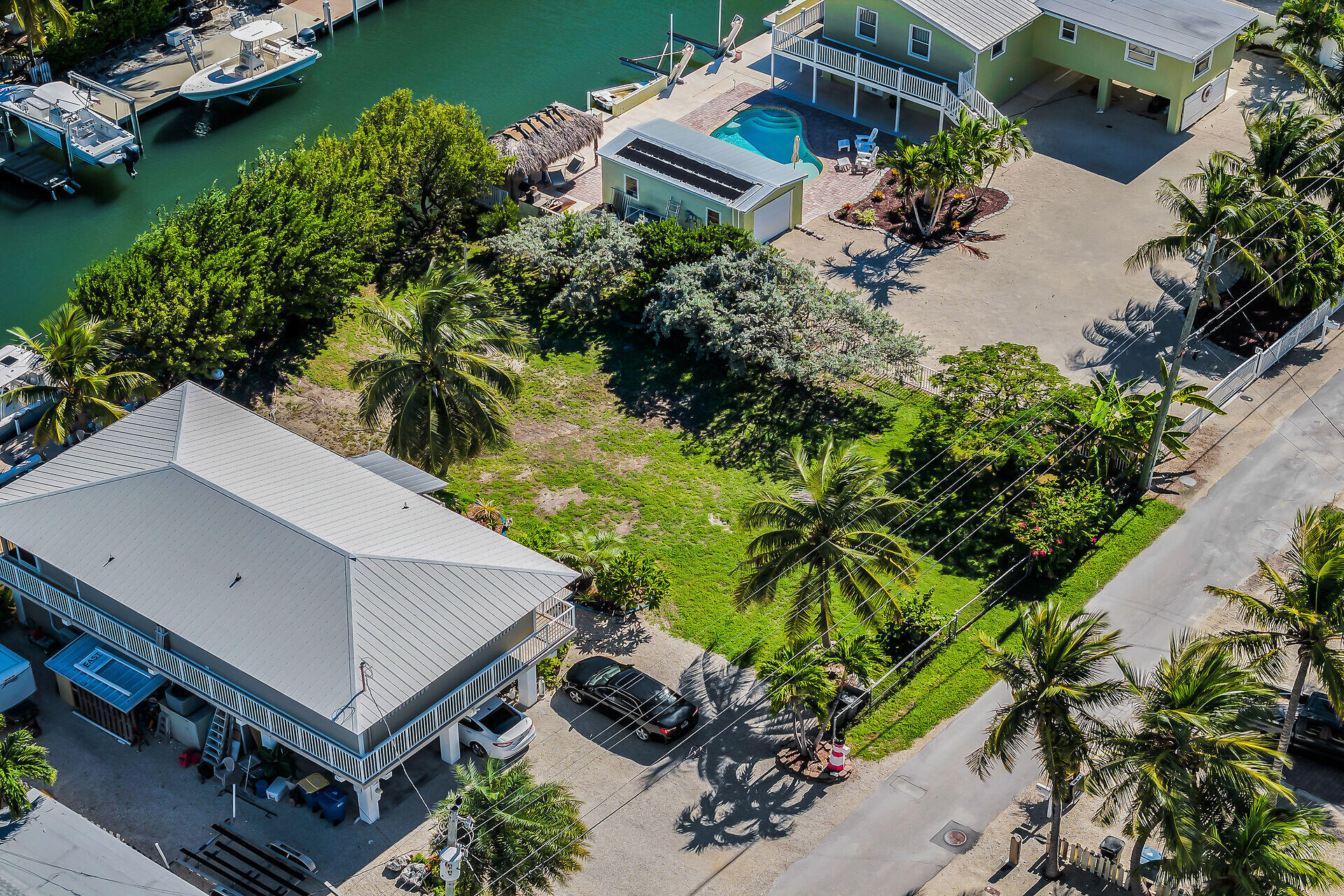 This exceptional canal-front vacant lot on Lower Matecumbe Key represents a truly prime piece of cleared real estate. The permit for this property is being picked up 6/12/26. Seize this rare opportunity to build your dream home in a highly sought-after Keys location.