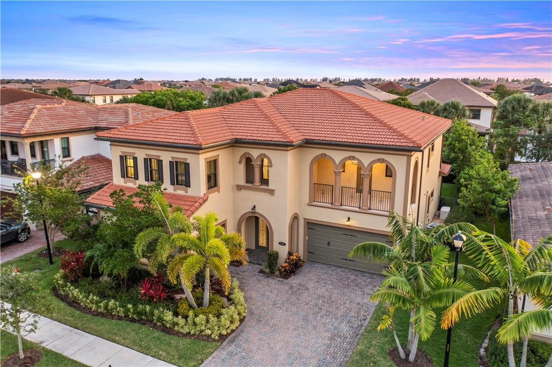 DREAM HOUSE ALERT! The Moment You Walk In and See The Grand Staircase You Be Will Swept Away! This Home Features a Full Home Generac Generator, Complete Separate His and Her Bathrooms in the Primary Suite, Gorgeous Gourmet Kitchen w/ Huge Center Quartz Island, Designer Finishes, Custom Closets, Extended Lanai, Gas Hookup For Summer Kitchen, Fully Fenced Backyard Waiting for A Custom Pool, Custom Window Treatments, Full Bedroom and Bathroom Suite Plus an Office All Downstairs, Enormous Primary Bedroom Upstairs, Luxury Vinyl Wood Flooring Upstairs w/ Loft and 3 More Bedrooms, Every Bedroom Has Access to Own Bathroom, Perfect for a Large Family, Enjoy Resort Style Amenities, Pool, Splash Park, Playground, Fitness Center, Tons of Activities for Residents, A+ Schools, Live in Luxury Here!