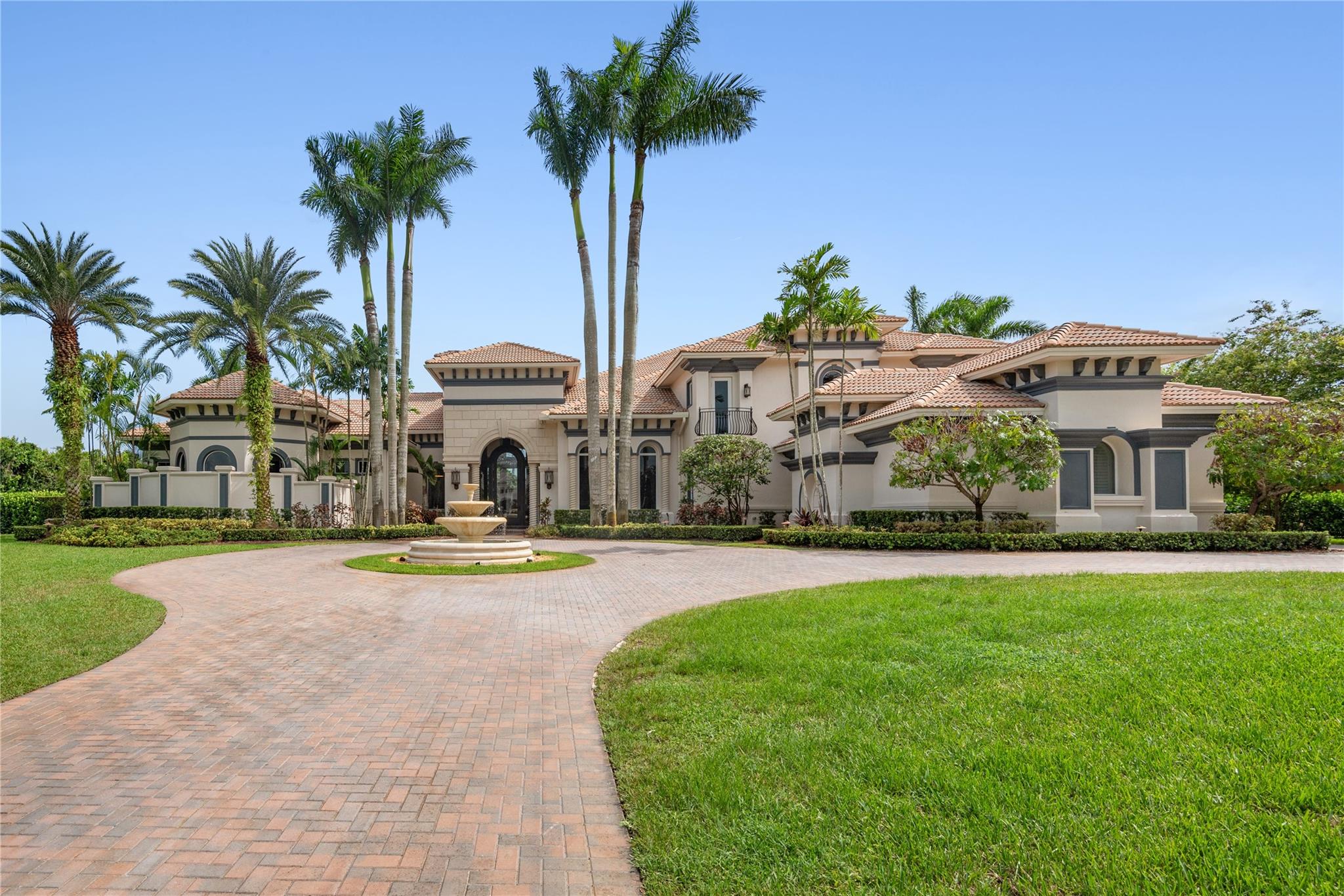 Discover luxury living in Landmark Ranch Estates! Designed for entertaining, this sprawling 2.35 acre custom estate includes a 5-bdrm main house with game room, office, bonus room & theater. The gourmet kitchen has a large walk-in pantry, 2 dishwashers, 2 ovens & full size SubZero refrigerator & freezer. The 1st floor, oversized primary suite has a sitting area, wet bar, 2 walk-in closets & spa-like bath. The guest house holds the 6th bdrm & 6th full bath which also serves as cabana bath. You will find a separate man-cave with bar between the main house & guest house. The outdoor paradise features a basketball court, play-set, summer kitchen, pool & outside bar. The 5 car garage & circular driveway provide ample parking. Embrace sophistication & recreation in one exquisite property.