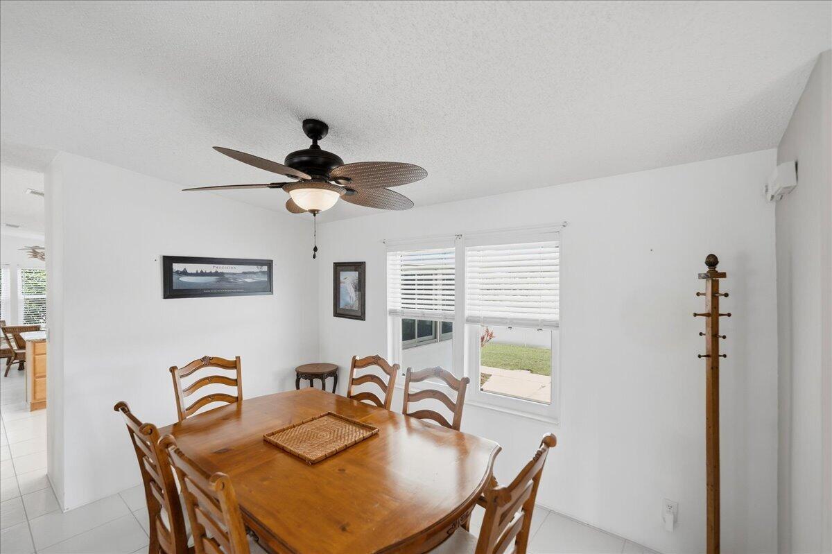 Discover this beautifully maintained 2-bed, 2-bath land-owned manufactured home on a desirable corner lot in the gated 55+ community of Savanna Club! Built in 1994 with 1,335 sq ft of living space, this move-in-ready home features a brand-new 2025 roof, 2020 A/C, impact windows, and thoughtful upgrades throughout. The remodeled kitchen offers granite countertops, stainless steel appliances, and a large breakfast nook. Enjoy a spacious king master suite with walk-in closet and dual-sink bath, plus a generous guest bedroom. Relax in the bright sunroom with acrylic windows and screens, and take advantage of the large outside storage and 3-car parking on this professionally landscaped lot. Offered fully furnished (select exclusions).