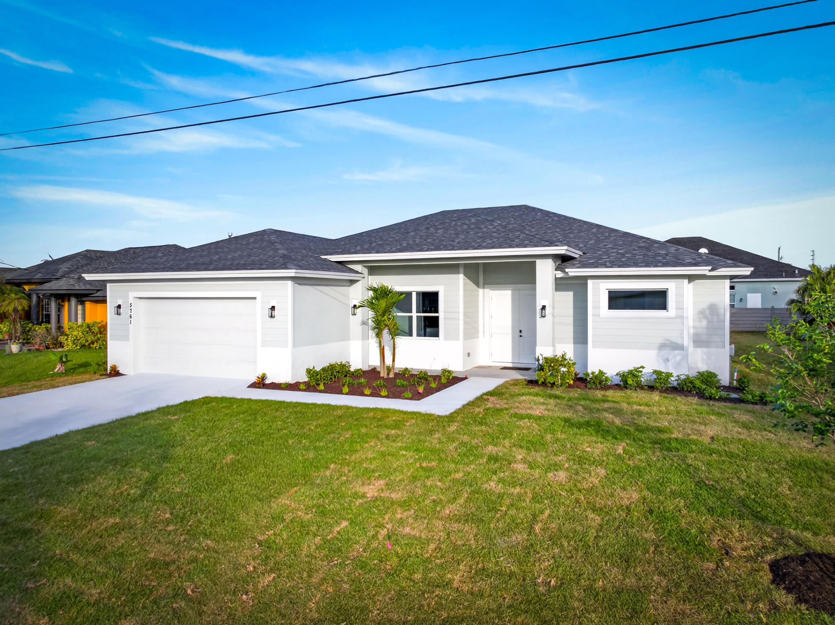 This newly completed, custom-built 4-bedroom, 3-bath residence by Southern Coastal Construction offers a rare opportunity to own a home where exceptional quality and thoughtful design take center stage. With $15,000 in flex buyer incentives, this property seamlessly blends modern elegance, durability, and energy efficiency. Constructed to a higher standard, the home features PGT impact-rated windows, spray foam insulation for superior efficiency and year-round comfort, and impressive 10-foot ceilings paired with 8-foot doors to create a bright, open living environment.  Premium builder selections are showcased throughout, including waterproof subflooring for long-term peace of mind, a full irrigation system for easy landscape maintenance, built-out closets for optimal organization, and sleek stucco soffits that enhance the home's refined exterior appeal. The grand living space is designed to impress, featuring elegant coffered ceilings that elevate the home's main gathering area. Thoughtfully designed accent walls add depth and character to both the dining area and the primary suite, creating stylish focal points in key living spaces. At the heart of the home, the designer kitchen showcases a striking oversized island—perfect for entertaining, gathering, and everyday living. Every element has been carefully curated to balance luxury with functionality, resulting in a space that is as practical as it is beautiful. Situated in the desirable Torino area with no HOA, this high-end new construction stands apart, offering a unique opportunity to own a fully customized home defined by superior craftsmanship, comfort, and style.
