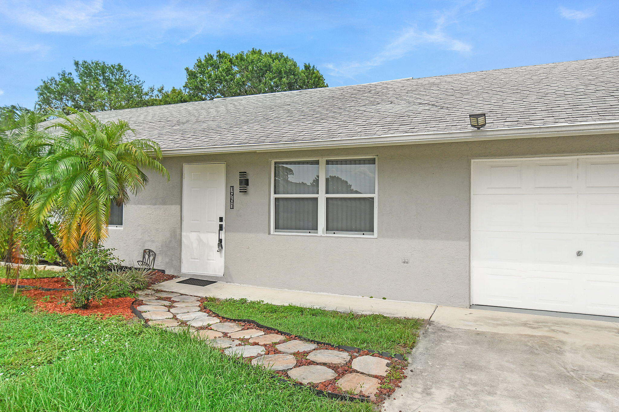 NEW ROOF TO BE INSTALLED!  Beautiful 3-bedroom, 2-bath CBS home centrally located in Port St. Lucie close to highways, schools, shopping, and dining. This well-maintained home features new tile flooring throughout, renovated bathrooms, vaulted ceilings, and a spacious screened patio perfect for relaxing or entertaining. Enjoy the large fenced backyard with plenty of room for pets, play, or future outdoor additions. A great opportunity to own a home in a convenient location.