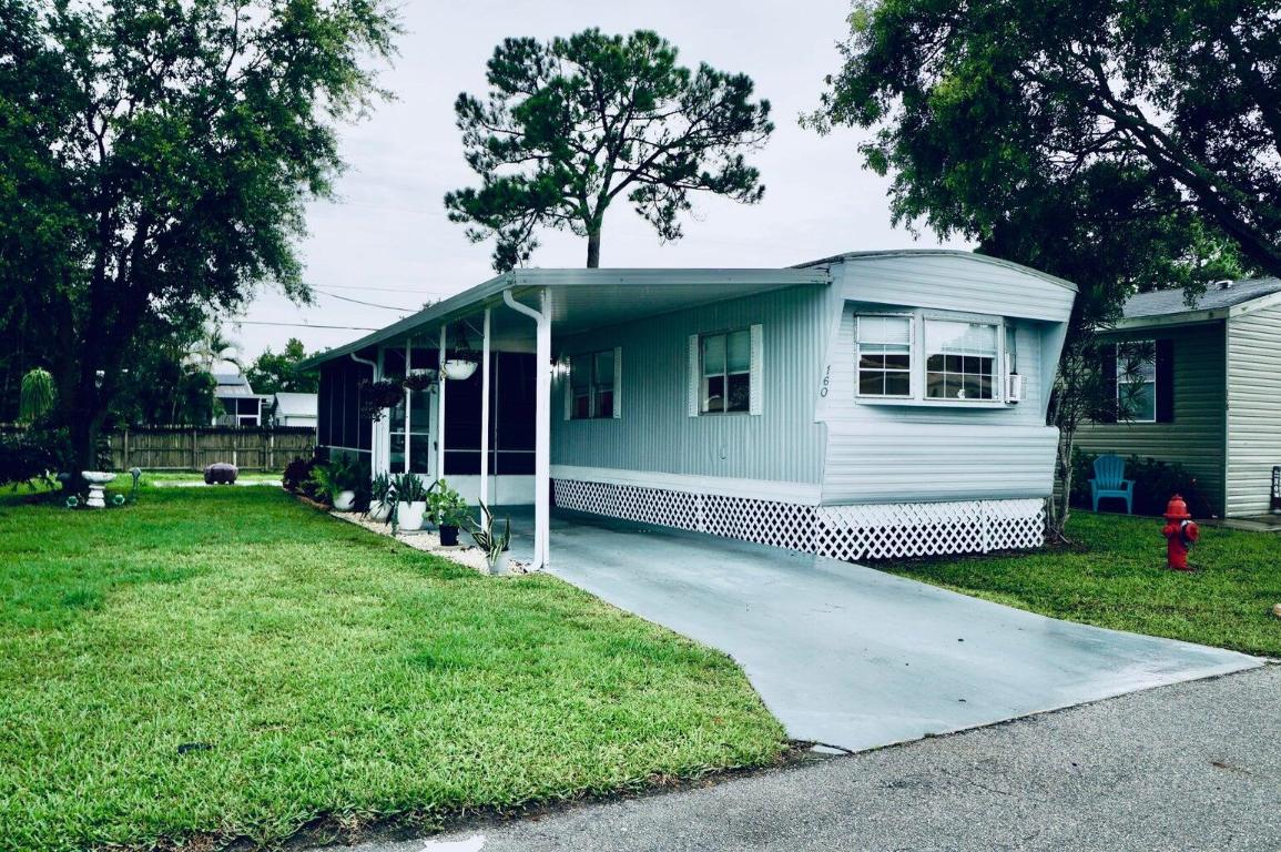 ALL AGE Community! PETS WELCOME! Completely Remodeled! Drywall throughout New Flooring throughout. Beautifully remodeled, spa-like bathrooms. Two bedrooms on opposite sides of home creating private space for each. Large 200sf porch / Florida room for extra entertaining space. Screens have just been replaced. Roof was waterproofed three years ago. Home backs up to green space, so there is no home behind you. This is a MUST SEE. This land leased home sits just off Federal Hwy in a private quiet park. Close to restaurants, hospital, shopping and BEACH. $923 land lease pays for lawn maintenance, basic cable, trash pick up and PROPERTY TAXES. Park amenities include, swimming pool, playground, and shuffle board. Call today to for a private tour.