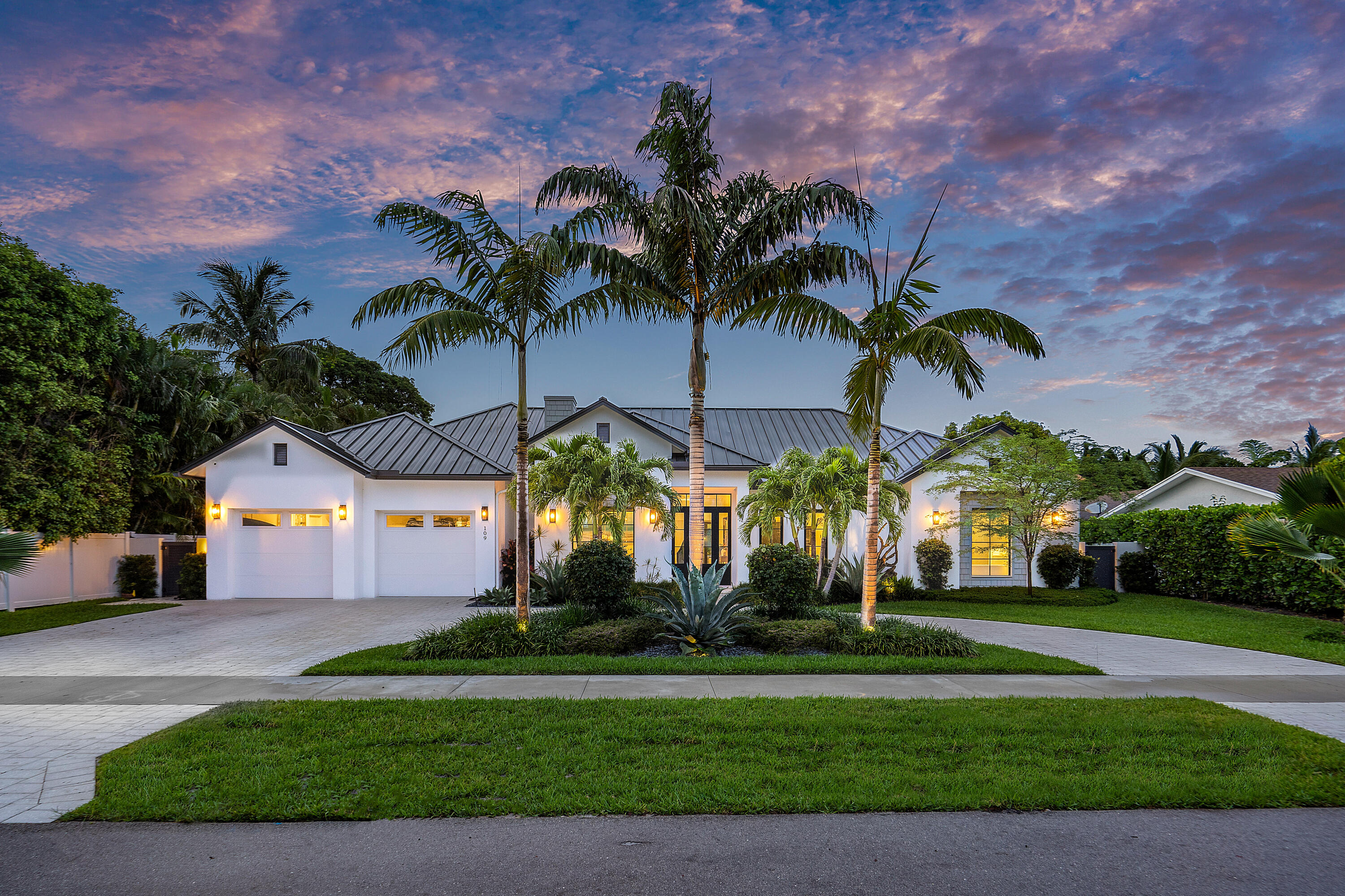Luxury coastal living has never been more inviting in East Delray Beach. This modern 
farmhouse, built in December 2020 by RTG Construction and Custom Homes has many luxurious upgrades. This elegant home comes fully furnished and is a turnkey gem with 5 bedrooms and 4.1 baths across 4,718 total SF, 3,658 of which are under air. The home sits 
just a few blocks from the pristine sands of Delray's public beaches and easy walking distance from the bustling lifestyle of Atlantic Avenue. Impeccably designed interiors & a lush landscaped 
exterior affords the perfect backdrop for living and entertaining. A heated saltwater pool with sun shelf and waterfall spa, outdoor shower, and large loggia with 2 fans and drop down 
screens. A full built-in kitchen, natural gas grill, outdoor fridge, sink, storage & TV provide a resort-like oasis. An open living design with French oak hardwood flooring throughout. A top-ofthe-line Thermador chef's kitchen that includes a 54"oversized and paneled refrigerator/freezer, 6 burner gas stove with dual ovens and a hooded griddle. Gorgeous quartz countertops, island 
seating, porcelain farmhouse sink, two-toned white/peppercorn cabinetry, water filtration system, walk-in pantry, and brick subway tile backsplash complete the designer touches. 
The kitchen overlooks the great room, with designer sconces, tongue and groove ceiling and a Sonos surround sound system that extends through the great room, kitchen, office, primary 
suite, master bath, and outdoor spaces.
The great room has vast windows and sliding glass doors that overlook the loggia and pool and allow natural light to flood in but offers privacy with 
electric draperies. 
The primary suite includes a spacious bedroom with sliding glass doors that overlook the pool, dual walk-in closets, an expansive primary bathroom, which boasts a designer chandelier and 
sconces, dual sinks with vanity seating, Kohler sinks and Moen fixtures, large scale 24"x48" porcelain tiles and quartz countertops, and a freestanding tub. Three of the home's additional bedrooms include their own ensuite bath and walk-in closet, with another just off the great room that could be either a fifth bedroom or a superb home office, and each of the home's 
bedrooms include motorized shades with blackout and privacy settings. Additional amenities include a 2-car garage with epoxy floors and EV charging station, generous laundry room with 
linen cabinets, whole house 24KW Generac generator, Impact glass windows with a standing seam metal roof, linear diffusers in the main living areas, a Rinnai tankless gas water heater 
with recirculating pump, and recently buried power lines.
**All furniture included. Artwork in dining room and over the grill in the summer kitchen will stay as well as AV equipment, washer and dryer.  Accessories and personal items and tree in master bathroom not included. 

The information published and provided including but not limited to prices, measurements, square footages, lot sizes, features, finishes, and calculations are subject to errors, omissions or changes without notice.  All such information should be independently verified.  All parties should perform their own due diligence to verify all information.